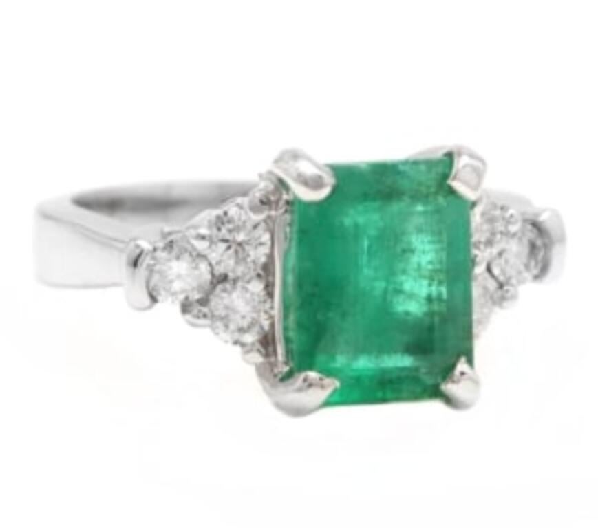 2.80 Carats Natural Emerald and Diamond 14K Solid White Gold Ring

Total Natural Green Emerald Weight is: Approx. 2.50 Carats (transparent)

Emerald Measures: Approx. 9 x 7mm

Emerald Treatment: Oiling

Natural Round Diamonds Weight: Approx.  0.30