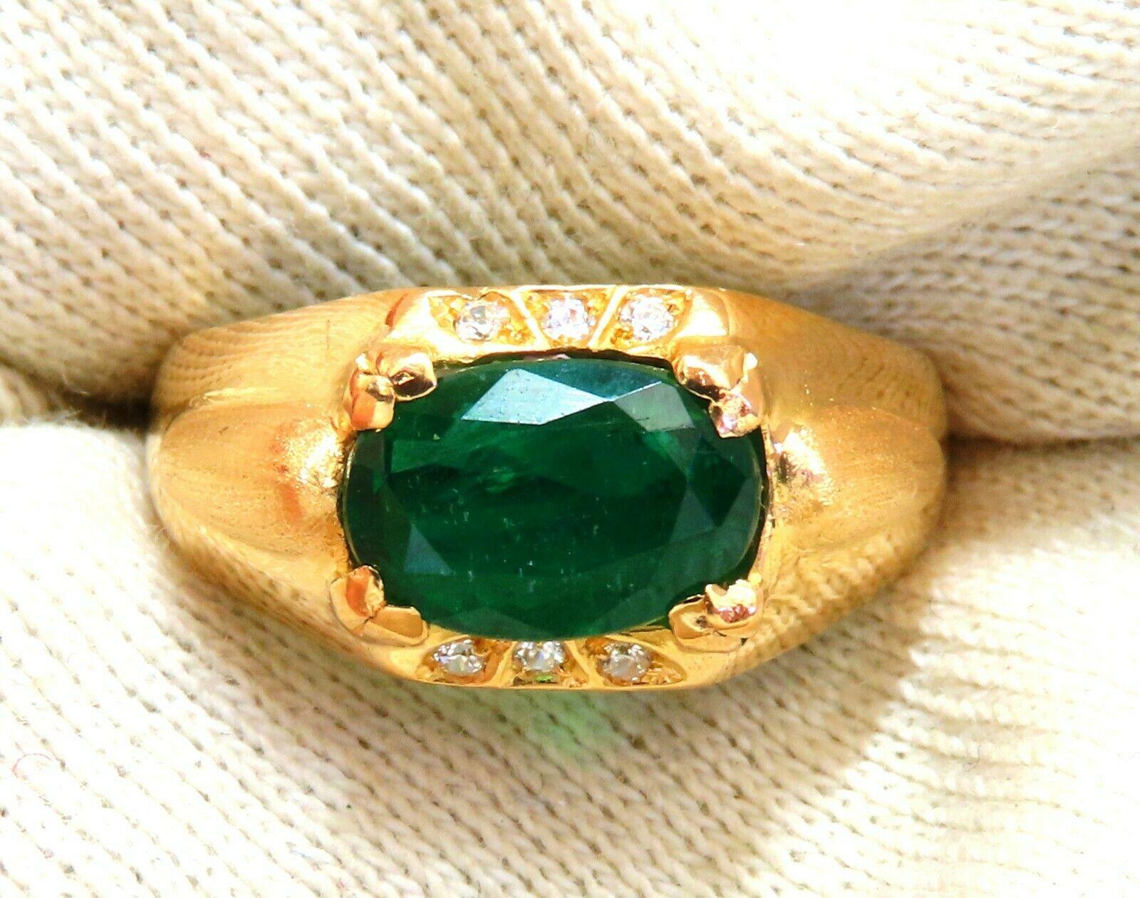 Mens Natural Emerald Ring.

2.80ct. Natural Oval cut, Emerald Ring

Emerald: 10 x 7mm 

Transparent & Vivid Green 

.12ct. Diamonds.

Round & full cuts 

G-color Vs-2 clarity.  

16kt. yellow gold

6.4 grams

Ring Current size: 8

Depth of ring: