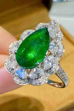 2.80ct Pear Cut Emerald & 1.20ct Diamond Halo Ring in 18K White Gold