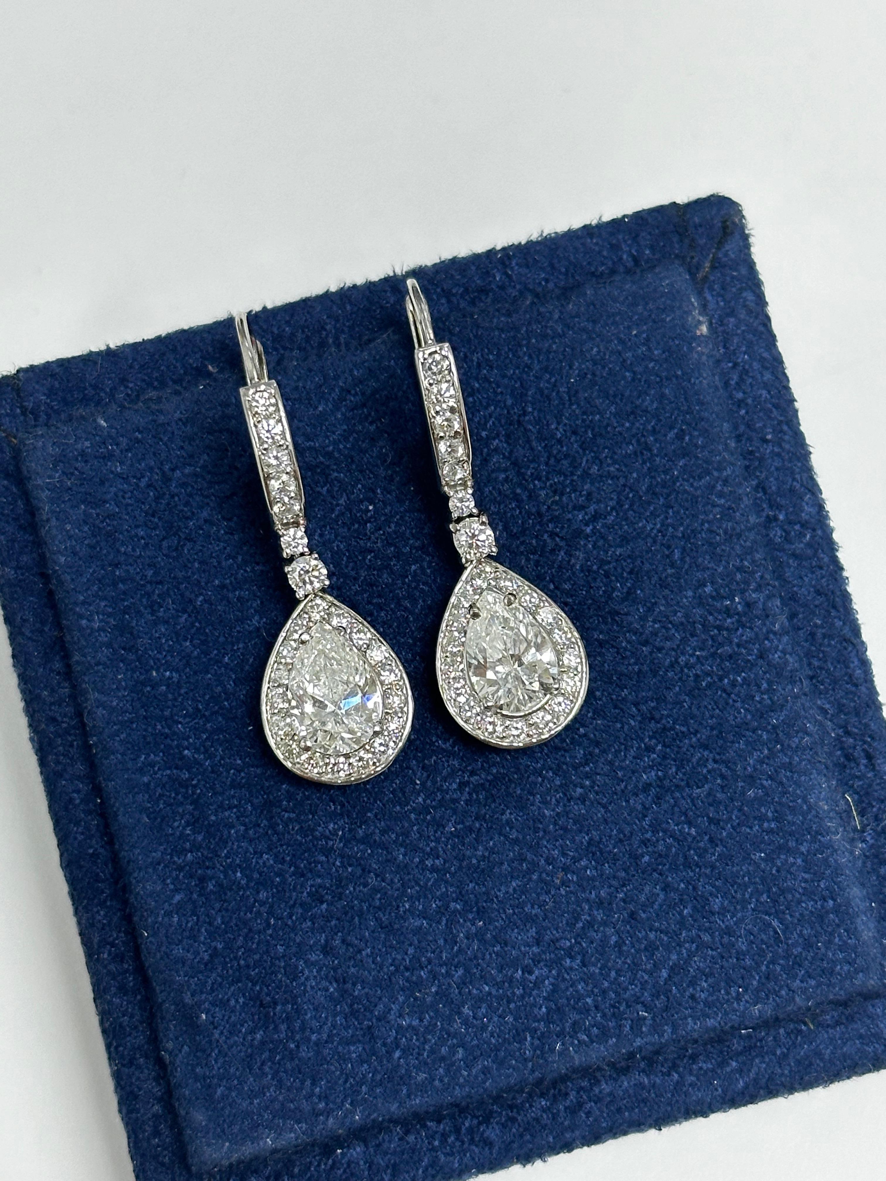Contemporary 2.80ct Pear-Shaped Solitaire Diamond Halo Drop Earrings For Sale