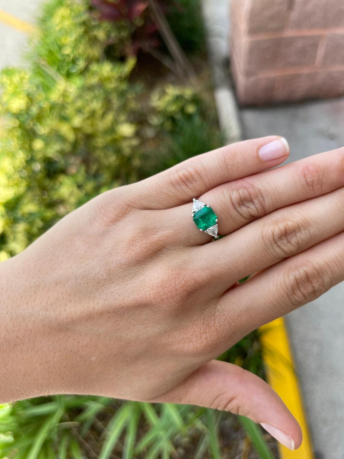 trillion cut emerald ring