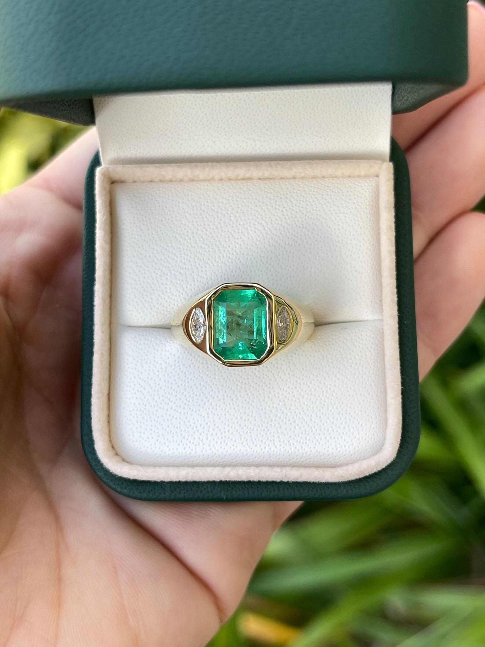 Shower her with love with this Colombian emerald and diamond three-stone ring. An extraordinary custom-created ring. Designed and created by our own master jeweler, 