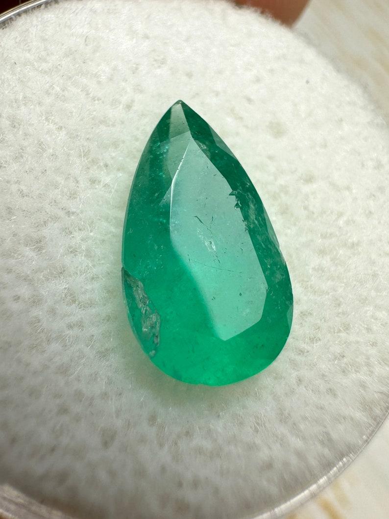 Stone: Emerald
Weight: 2.81-carats
Shape: Pear Cut
Clarity: Semi-Transparent
Luster: Good
Color: Medium Bluish Green
Measurements: 12.87mm x 7.60mm x 5.75mm
Geographic Origin: Colombia
Treatment: Natural, Oiling with Resin

Comments: Due to their