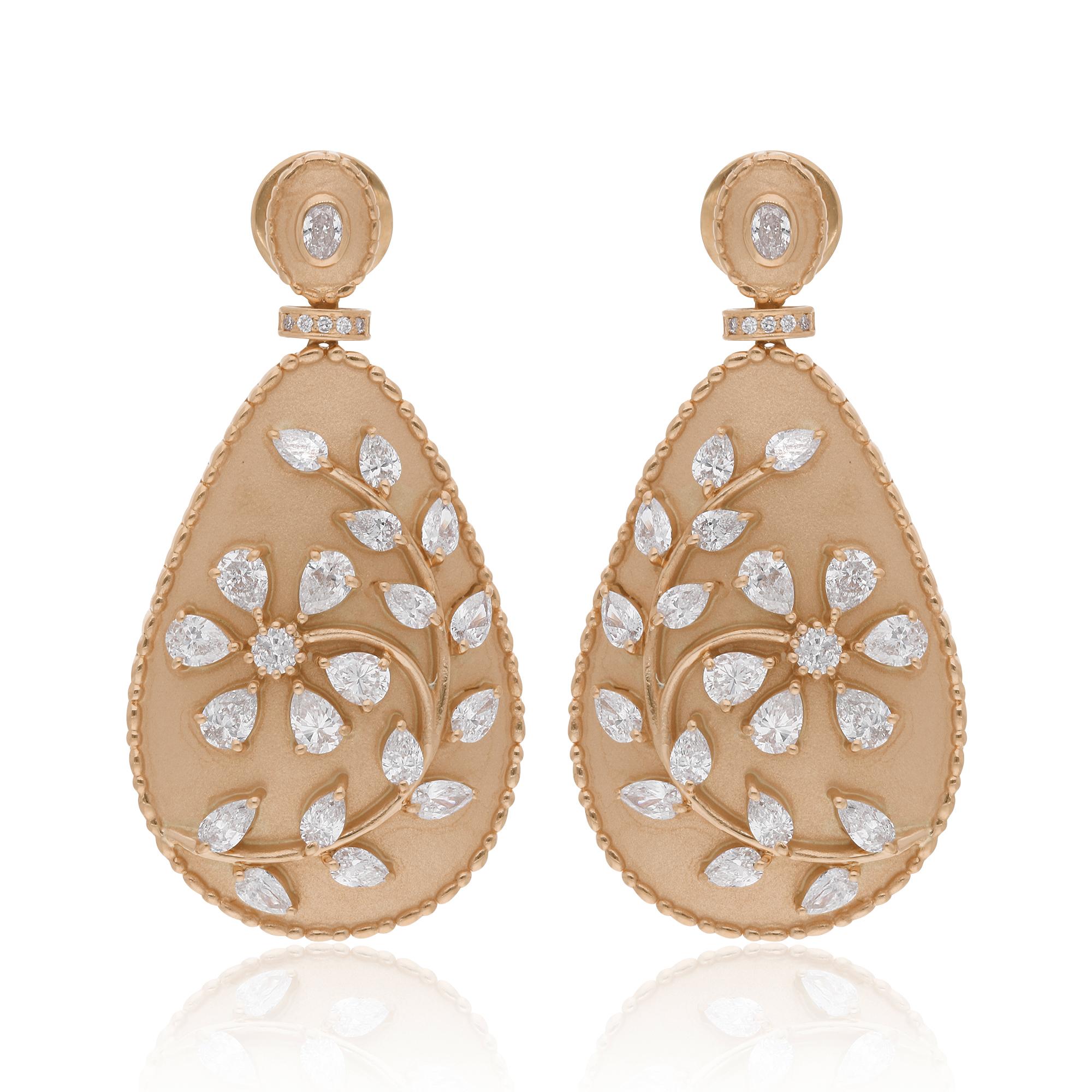 Adorn yourself with the enchanting elegance of these 2.81 Carat Pear & Round Diamond Dangle Earrings, meticulously crafted in radiant 18 Karat Yellow Gold. These exquisite earrings are a radiant celebration of sophistication and grace, designed to