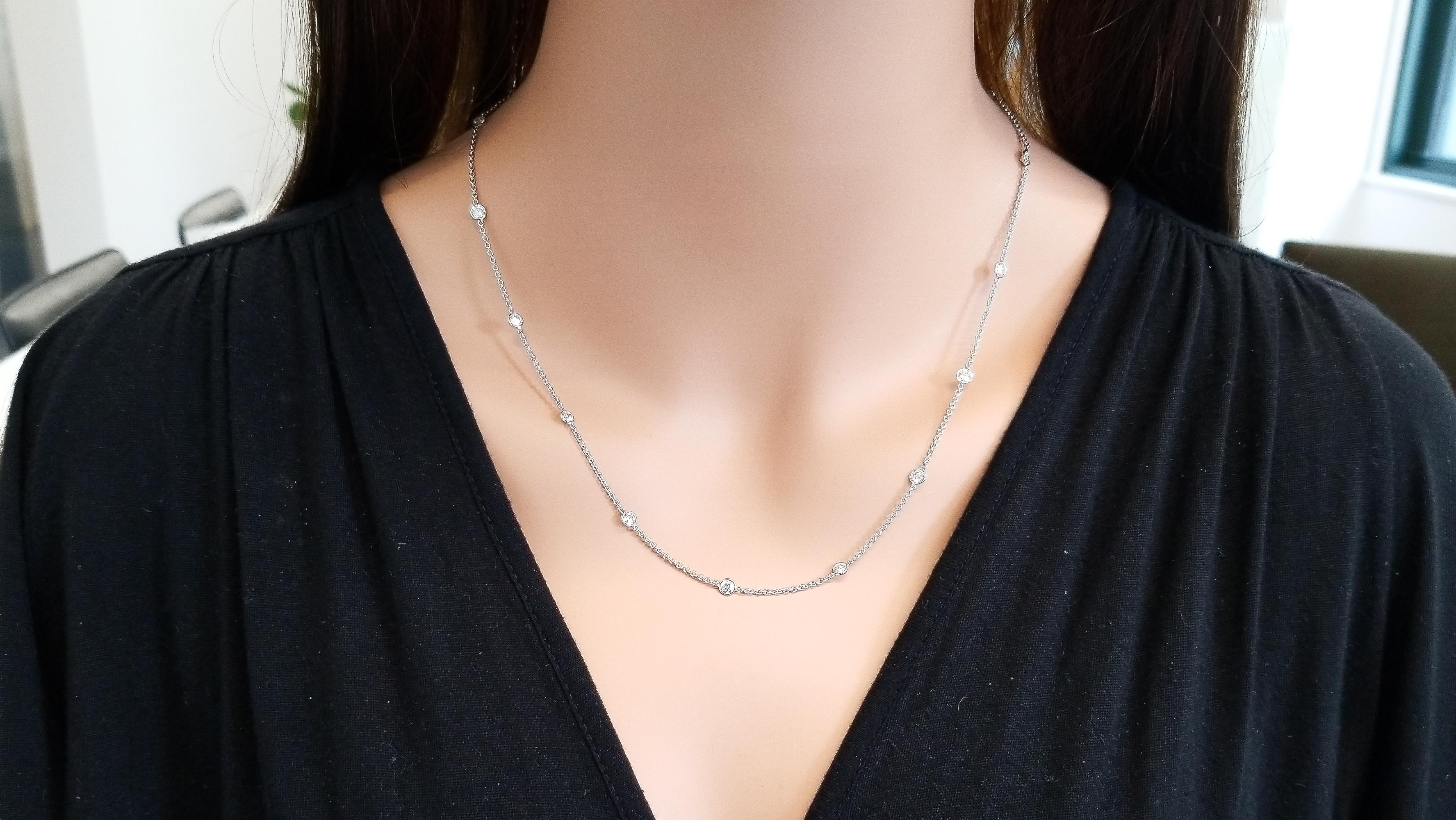 This is a diamond station necklace. This lovely 14 k white gold chain features 2.81 carats diamonds. Each diamond is 3.50 mm in diameter, hand wrapped in its own bezel. Glittering from every angle, wear it as is or with your favorite pendant.