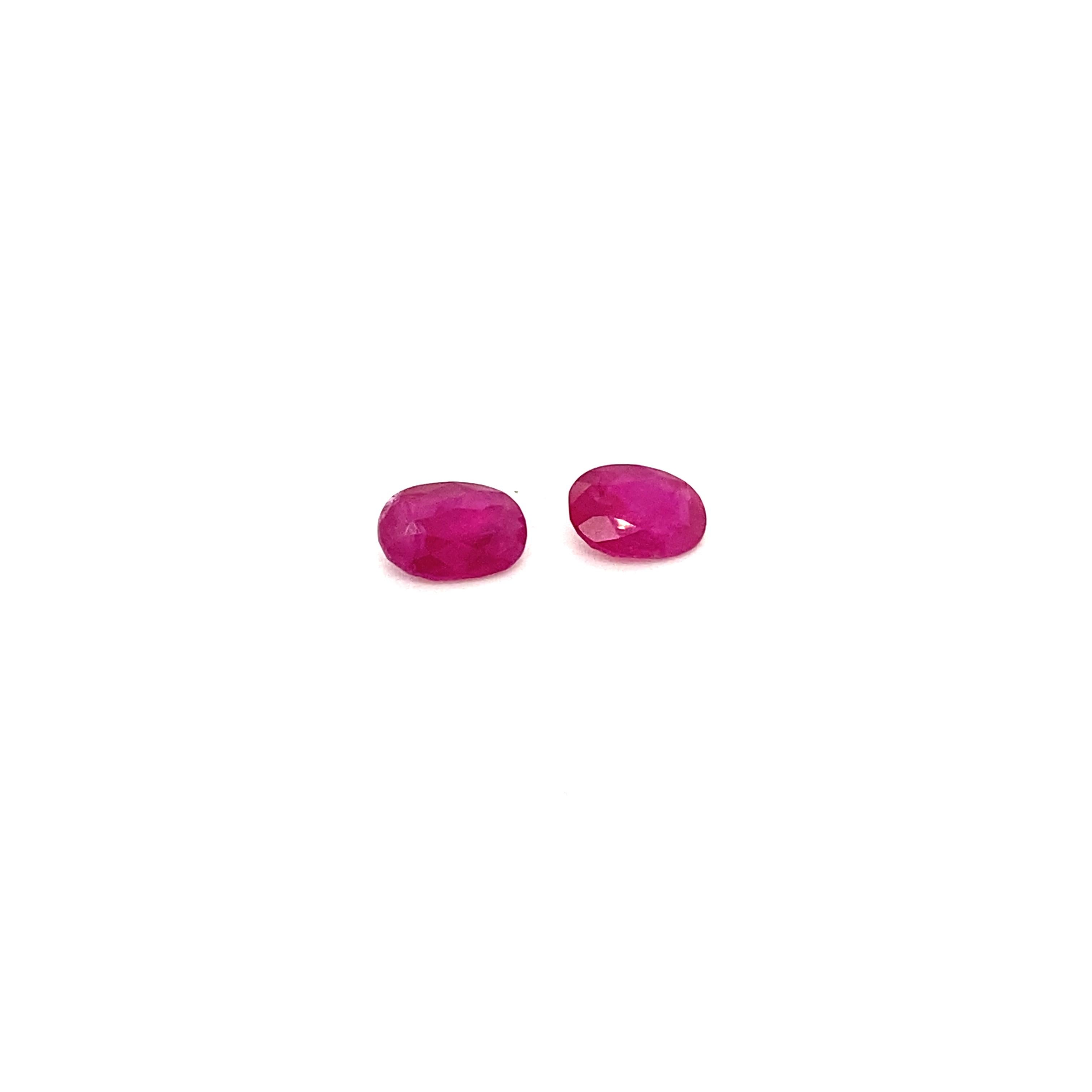 2.81 Carat Unheated Oval-cut Burmese Rubies, Pair:

A beautiful pair, they are oval-cut unheated Burmese rubies weighing a total of 2.81 carat. The rubies have good cutting proportions, and possess good colour saturation and brilliance. The origin