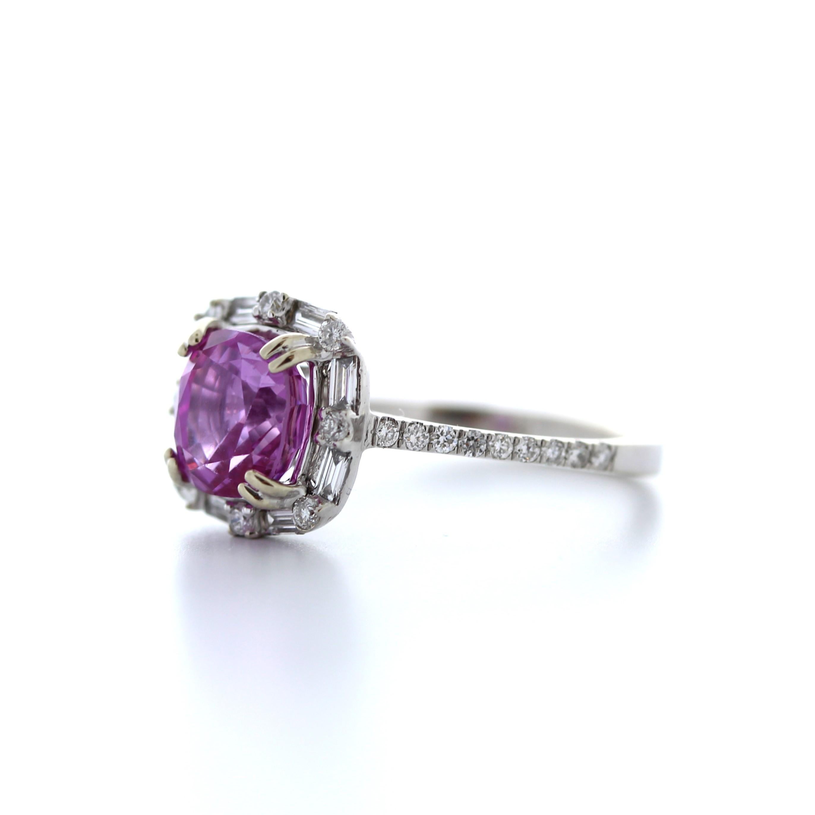 This enchanting 2.81 carat weight round pink sapphire fashion ring is a beautiful and feminine choice for any occasion. The sapphire is a lovely shade of pink and boasts exceptional clarity and brilliance, weighing in at 2.81 carats. It is set in