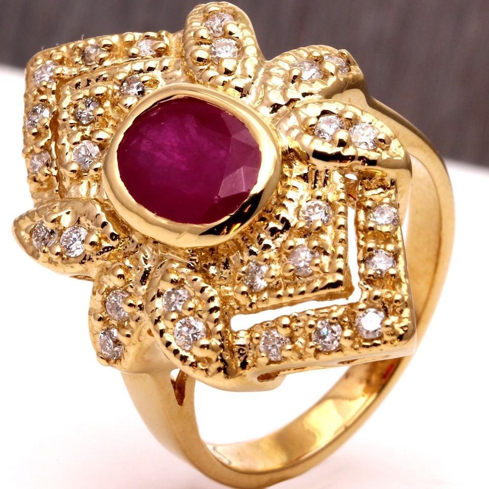 2.81 Carats Impressive Natural Red Ruby and Diamond 14K Yellow Gold Ring

Total Natural Red Ruby Weight is: Approx. 2.06 Carats

Ruby Measures: Approx. 8 x 6.4mm

Ruby Treatment: Lead Glass Filling

Head of the ring measures: Approx. 25.74 x