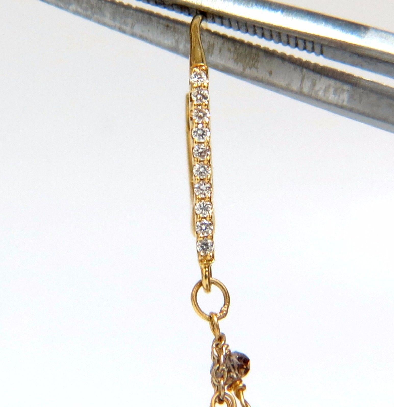 Floating Curtain / Flat Mesh 

Fancy Color Diamonds Briolette Earrings

28cts of Rose Cut / Briolette diamonds: 

Fancy Natural Browns, Yellow & Light Yellows.

Vs-2 Si-1 clarity.

.15ct. Upper Tier White Diamonds:

G-color Vs-2 clarity.

18kt.