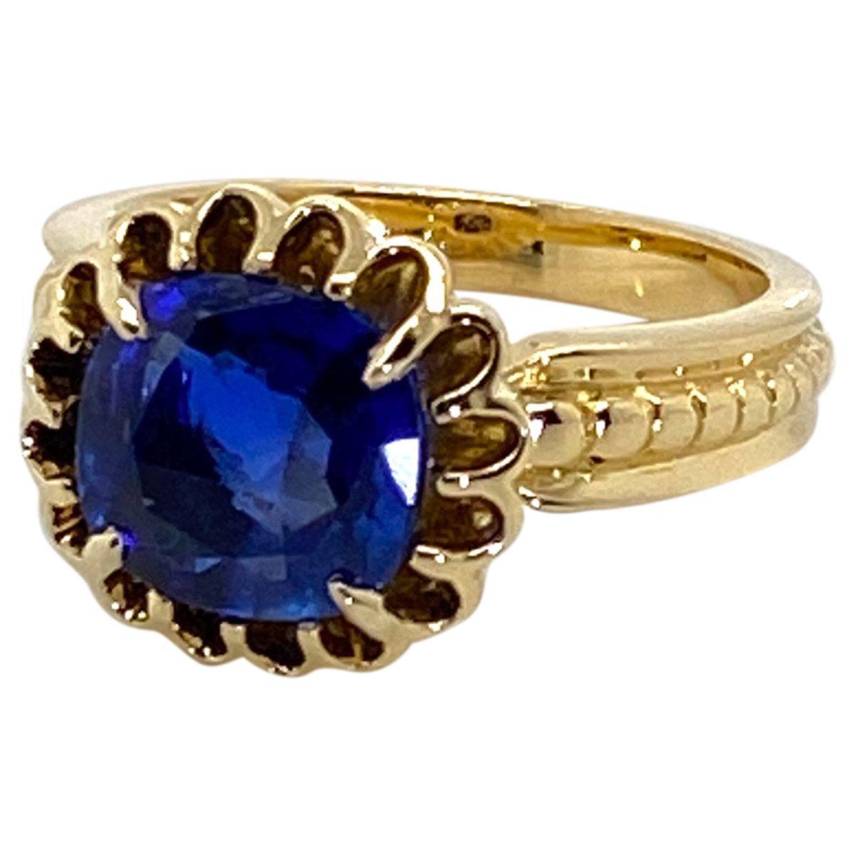 The combination of 18k yellow gold and this royal blue sapphire is what draws your attention to this beautiful ring.  Featuring a magnificent 2.82ct certified unheated Burma (Myanmar) blue sapphire with a depth and intensity that only can be