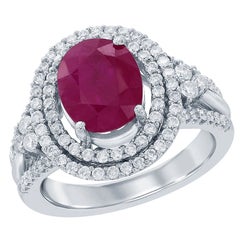 Bague de fiançailles en or blanc 18 carats avec diamants et rubis de taille ovale de 2,82 carats