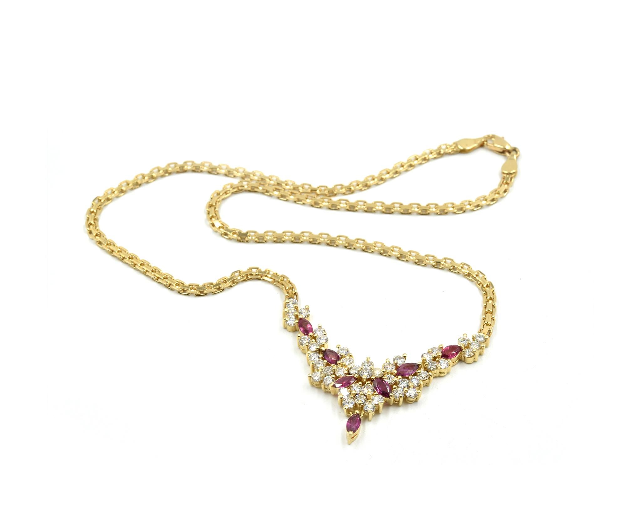 Designer: custom design
Material: 14k yellow gold
Diamonds: 42 round brilliant cut diamonds = 2.82 carat total weight
Rubies: seven marquise cut rubies
Dimensions: necklace is 17-inches long
Weight: 18.91 grams

