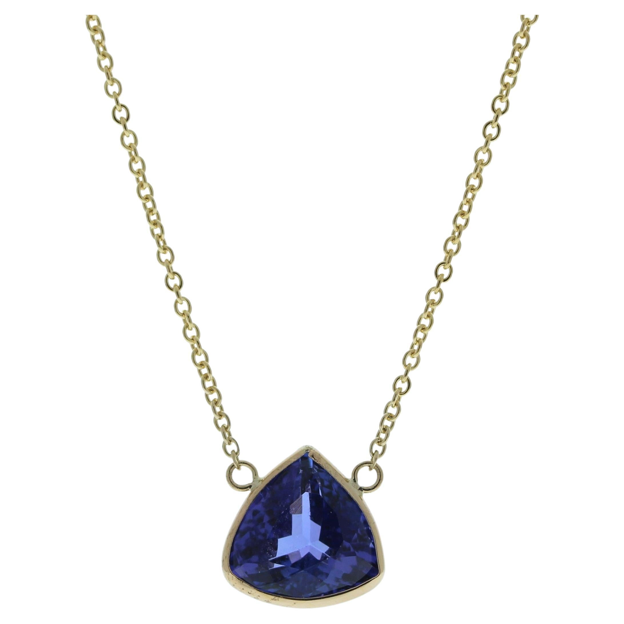 2.82 Carat Trilliant Tanzanite Blue Fashion Necklaces In 14k Yellow Gold For Sale