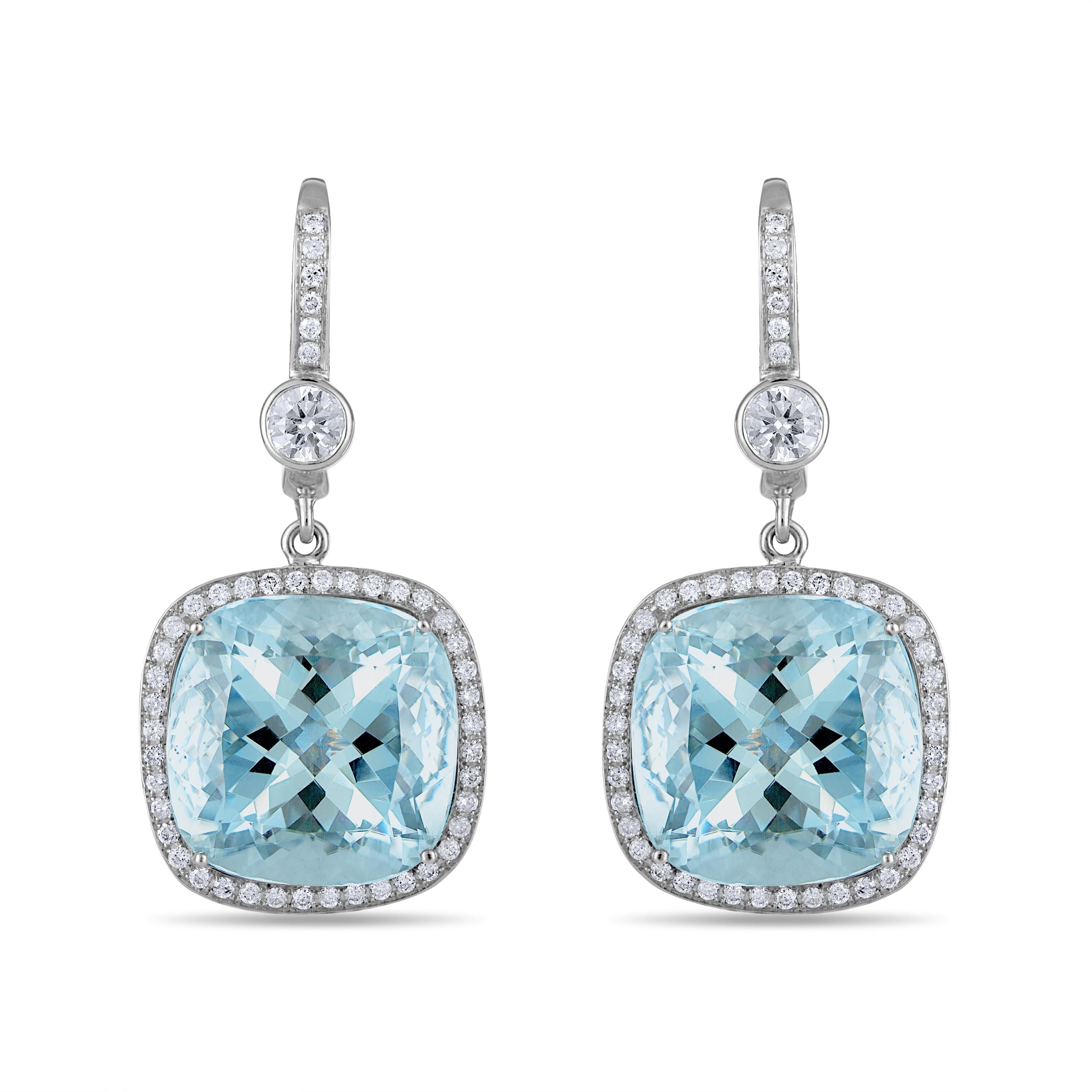 34.01 Carat Natural Oval-Cut Aquamarine and White Diamond Gold Earrings:

A stunning pair of earrings, it features 2 cushion-cut natural aquamarines weighing 28.23 carat surrounded and topped by white round-brilliant cut diamonds weighing 1.93