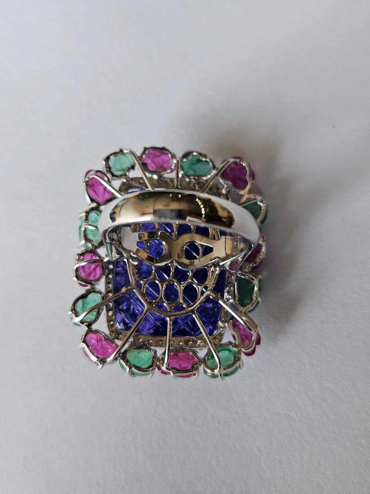 Art Deco 28.28 carat carved Tanzanite, Emerald, Ruby & Diamond Tutti-Frutti Cocktail Ring For Sale