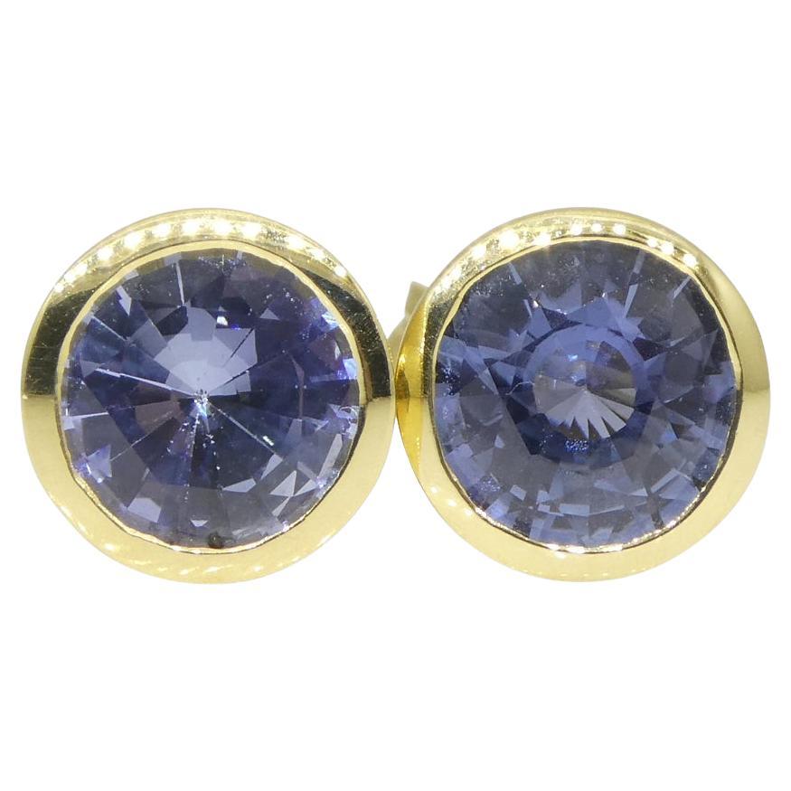 These two Sapphire's are bezel set in a pair of 18k Yellow Gold stud earring settings with butterfly backs.

These are made in Toronto, Canada, and are incredibly fine quality!

Description:

Stone Type: Sapphire
Number of Stones: 2
Weight: 2.82