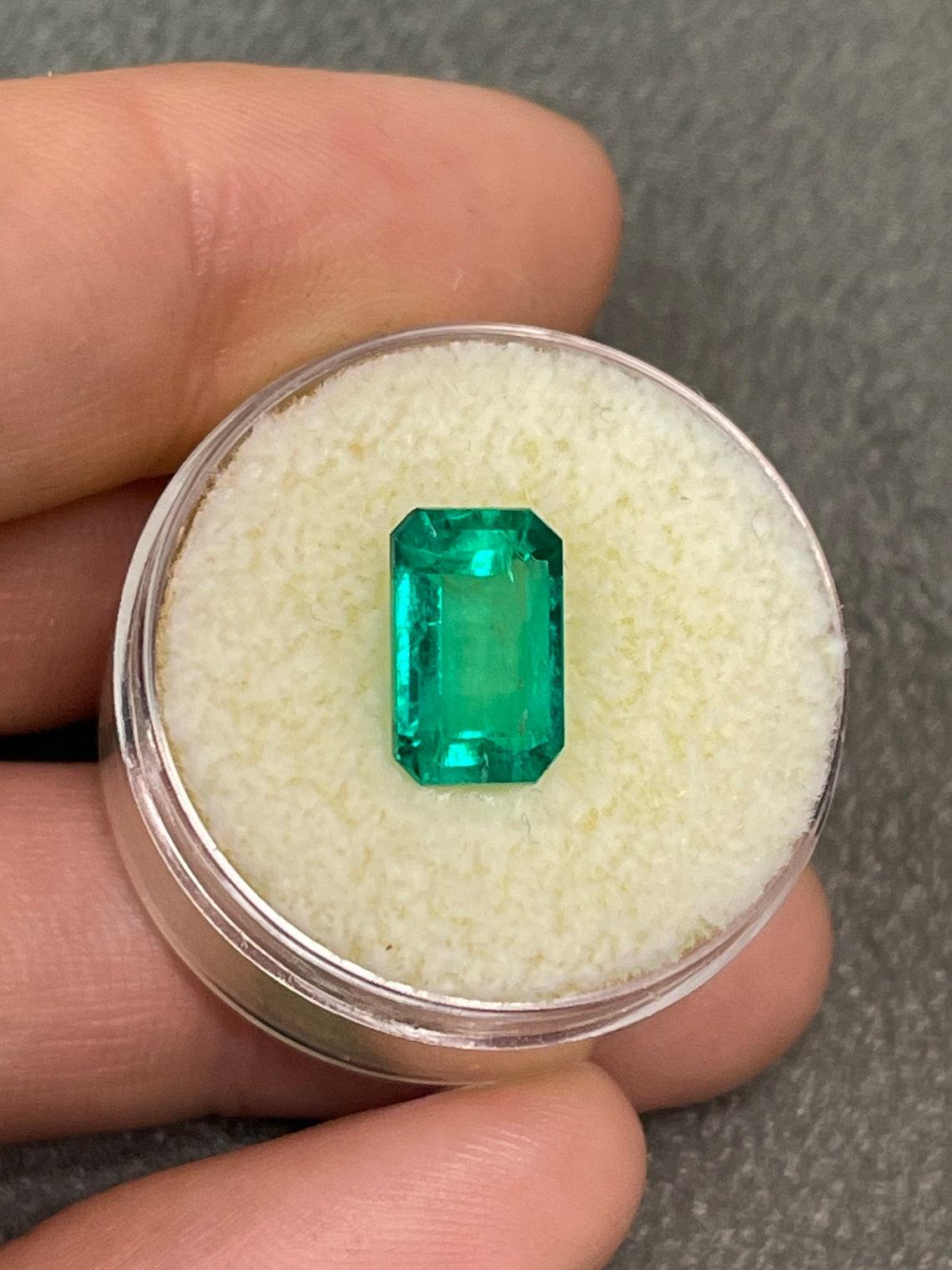 Modern 2.82ct Vivid Bluish Green Elongated Emerald Cut Colombian Gem Genuine May For Sale