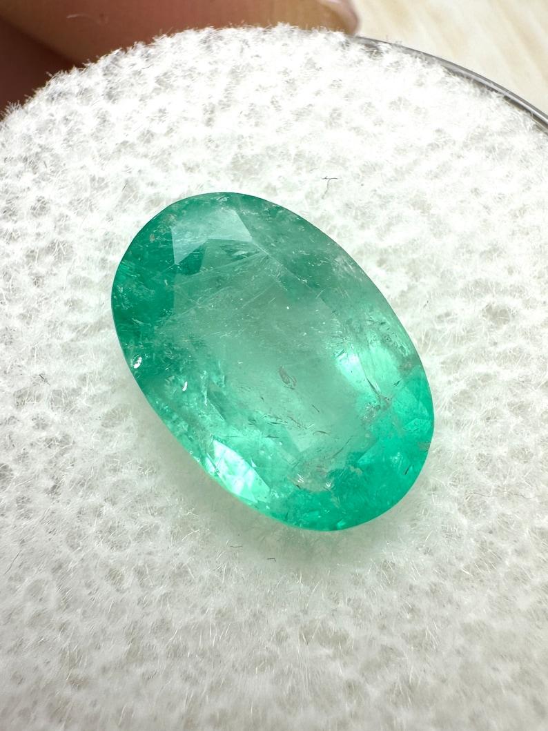 Stone: Emerald
Weight: 2.83-carats
Shape: Oval Cut
Clarity: Semi-Transparent
Luster: Good
Color: Light Green
Measurements: 10.87mm x 7.38mm x 5.17mm
Geographic Origin: Colombia
Treatment: Natural, Oiling

Comments: Due to their growth conditions in