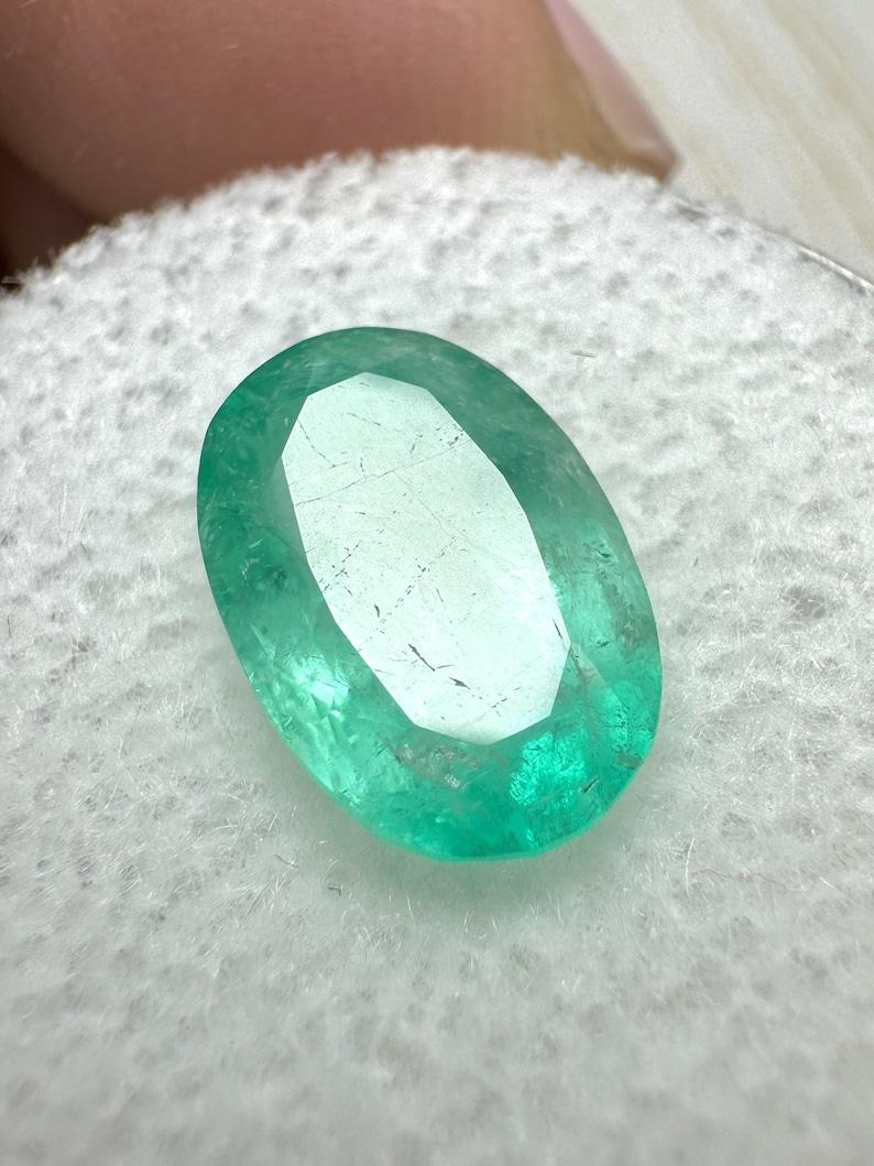 Modern 2.83 Carat 11x7mm Pastel Mint Green Colombian Emerald Oval Cut - May Birthstone For Sale