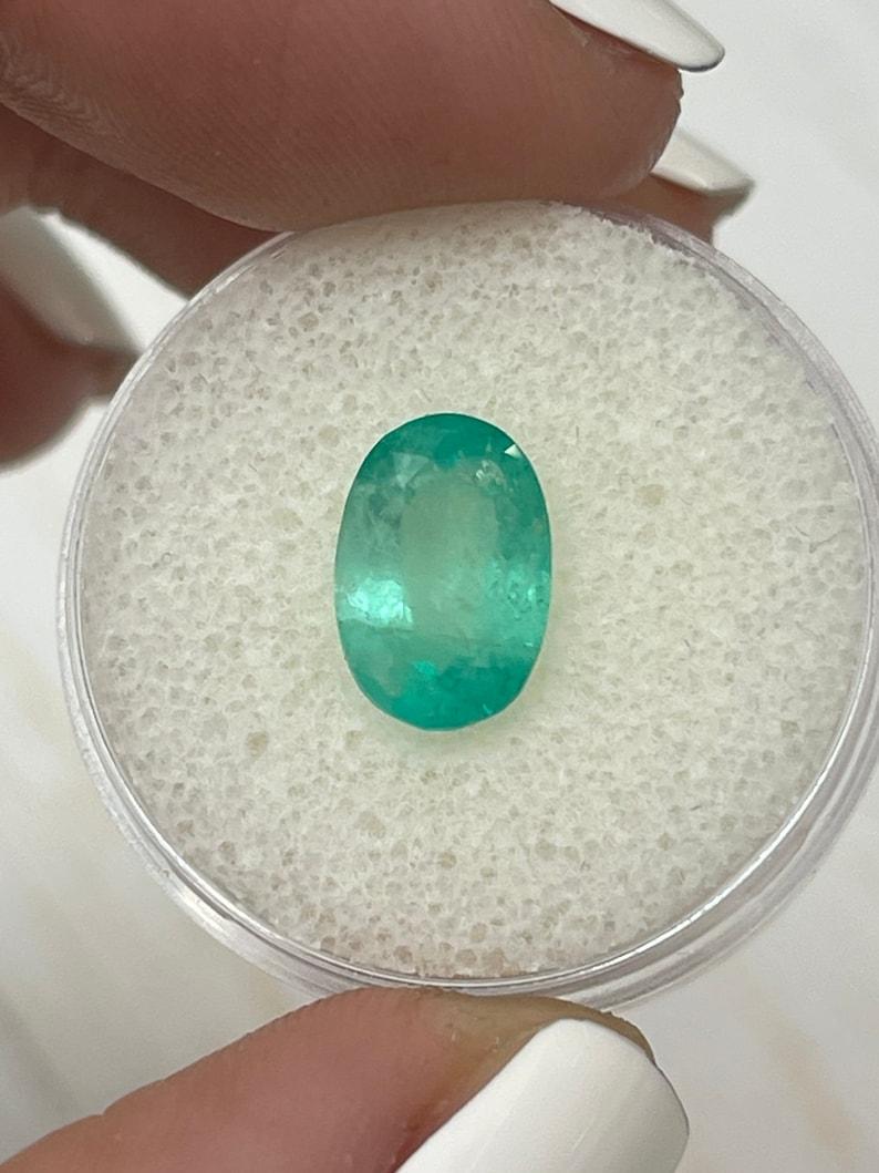 2.83 Carat 11x7mm Pastel Mint Green Colombian Emerald Oval Cut - May Birthstone In New Condition For Sale In Jupiter, FL