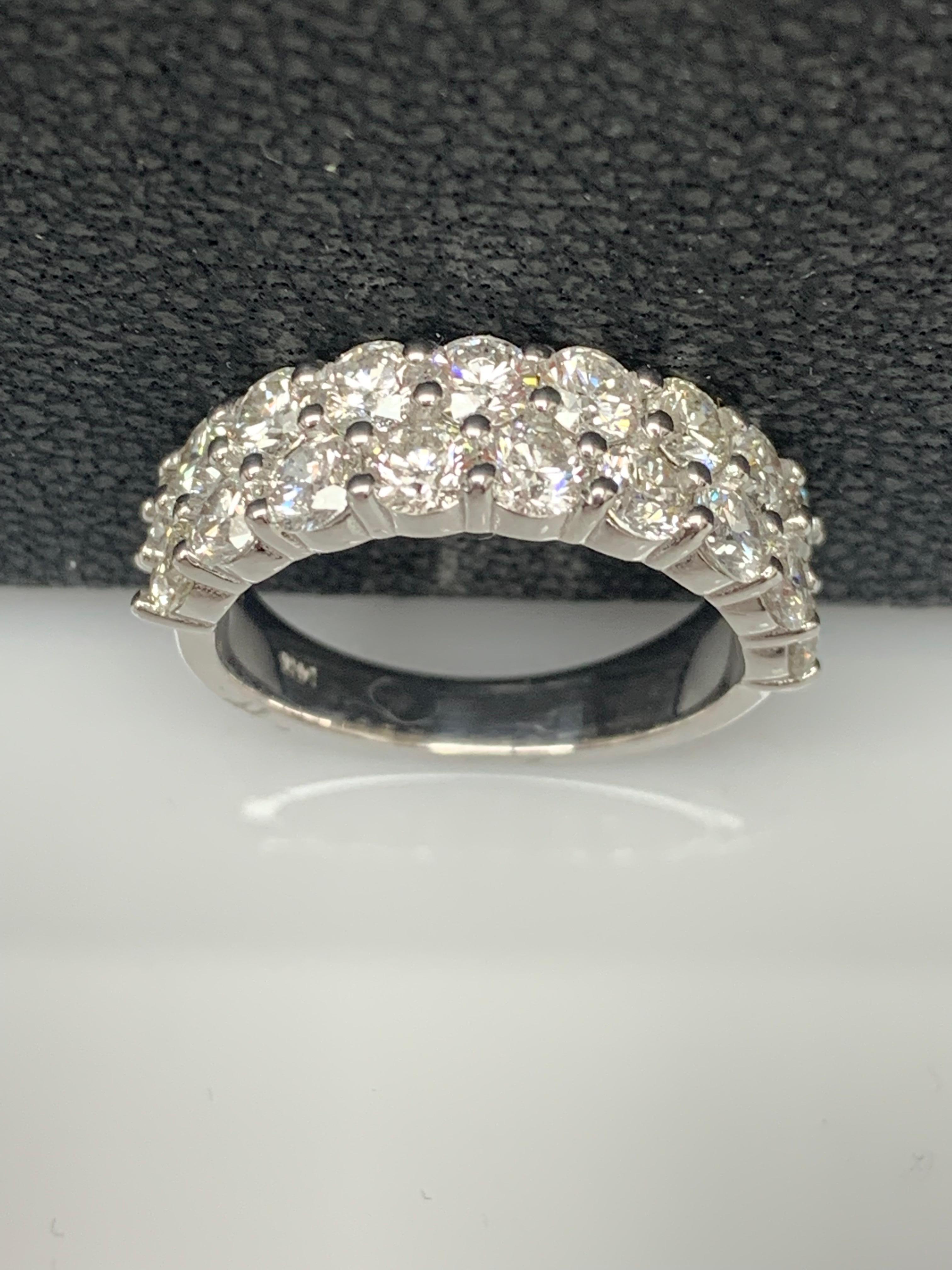 A unique and fashionable ZicZac ring showcasing two rows of 19 brilliant cut diamonds, set in a band design. Diamonds weigh 2.83 carats total. A brilliant and masterfully-made piece.

Style available in different price ranges. Prices are based on