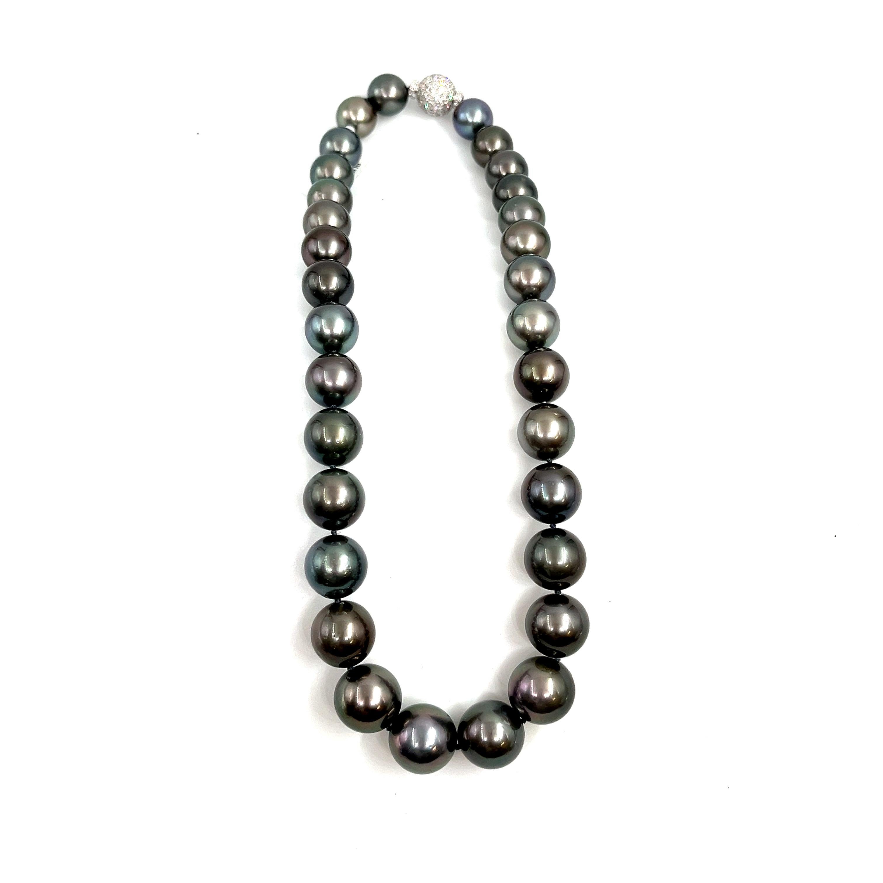 This beautiful and elegant natural Tahitian black pearl necklace features 99 diamonds weighing 2.83 ct set in 18k white gold. The pearls are between 12 mm and 15.80 mm thick. A stunning piece to add to any wardrobe. 
