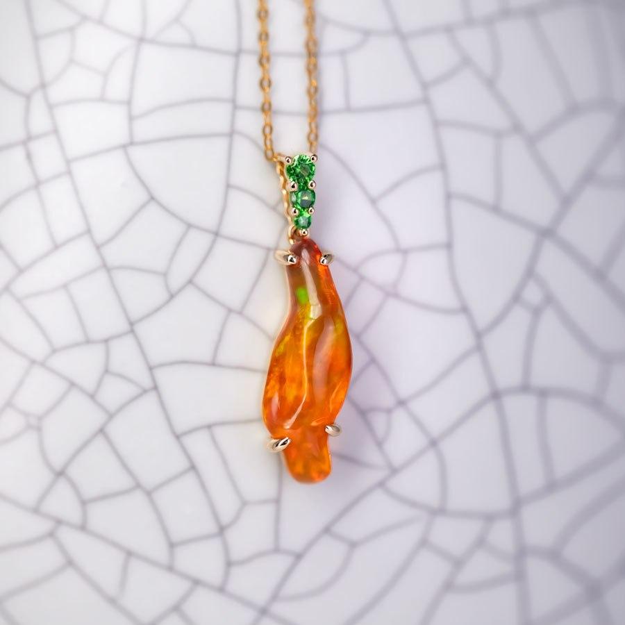 2.83 ct Mexican Fire Opal, Tsavorite Pendant Necklace 18K Yellow Gold.


Free Domestic USPS First Class Shipping! Free Gift Bag or Box with every order!

Opal—the queen of gemstones, is one of the most beautiful gemstones in the world. Every piece
