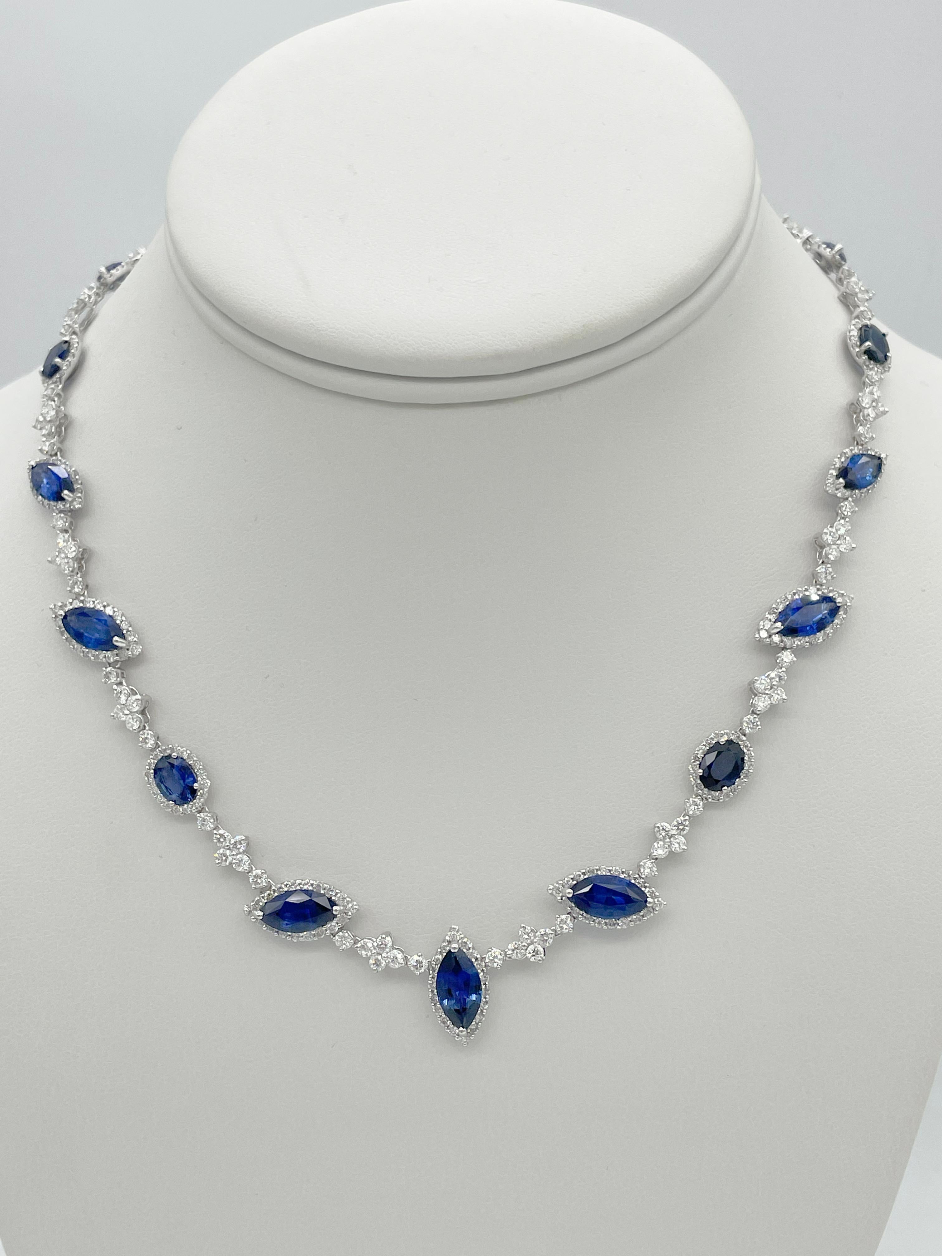 28.30 Total Carat Fancy Sapphire and Diamond, White Gold Necklace

This spectacular Blue Sapphire and Diamond necklace showcases a total 20.20 carats of Marquise and Oval cut sapphires of amazing color and quality. The conceal clasp features a