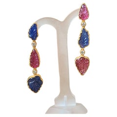 20.36 cts, Carved Blue Sapphires 
16.49 cts Tourmaline Chandelier/Dangle Earring