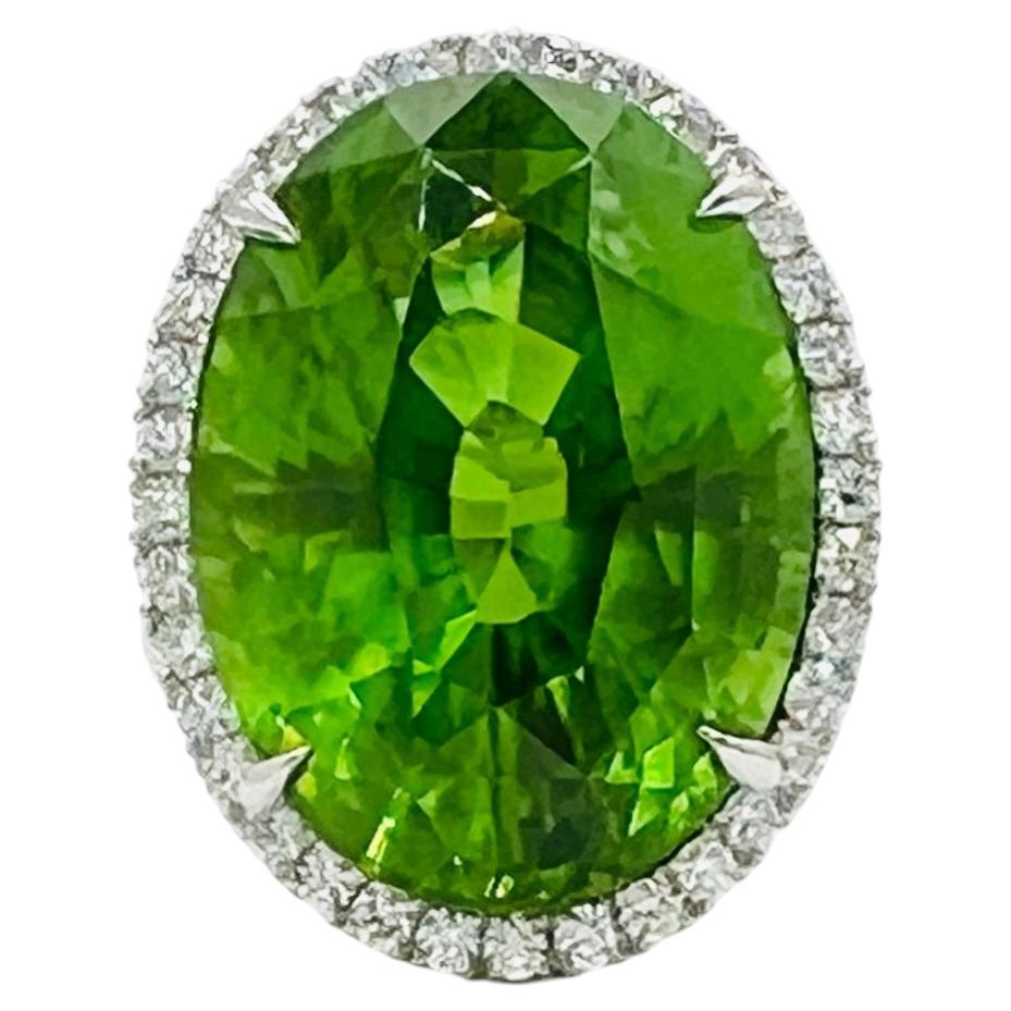 28.33 Carat Peridot Oval and White Diamond Ring in Platinum For Sale
