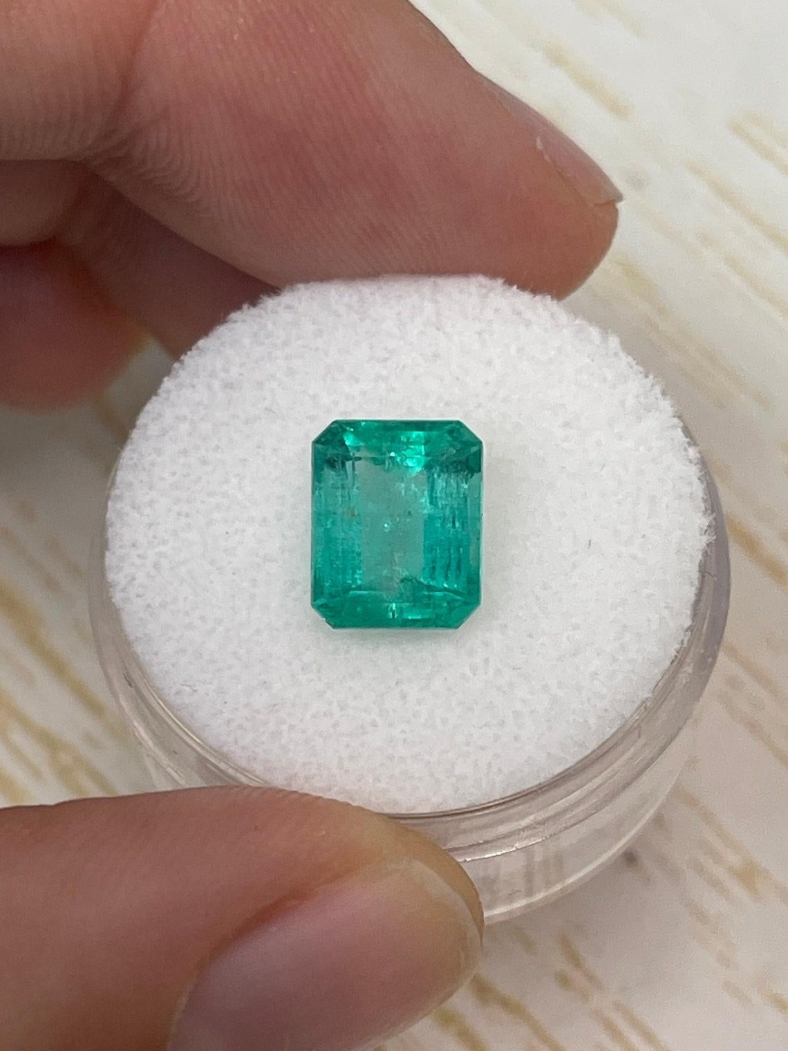 Stone: Emerald
Weight: 2.84-carats
Shape: Emerald Cut
Clarity: Transparent
Luster: Very Good
Color: Bluish Green
Measurements: 9.39mm x 7.72mm x 5.46mm
Geographic Origin: Colombia
Treatment: Natural, Oiling

Comments: Due to their growth conditions