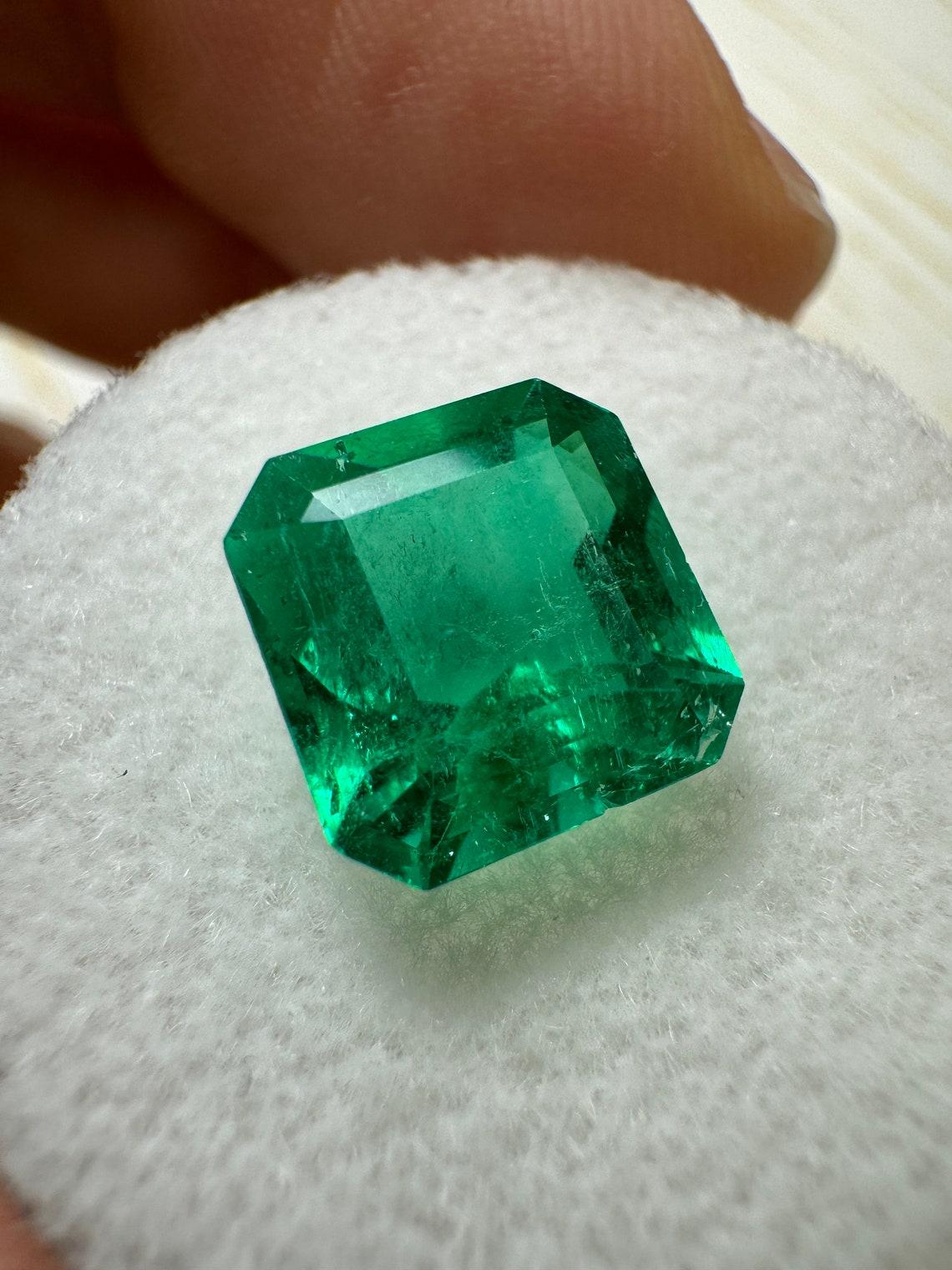Stone: Emerald
Weight: 2.84-carats
Shape: Asscher Cut
Clarity: Transparent
Luster: Excellent
Color: Vivid Muzo Green
Measurements: 9.01mm x 8.87mm x 5.77mm
Geographic Origin: Colombia
Treatment: Natural, Oiling

Comments: Due to their growth