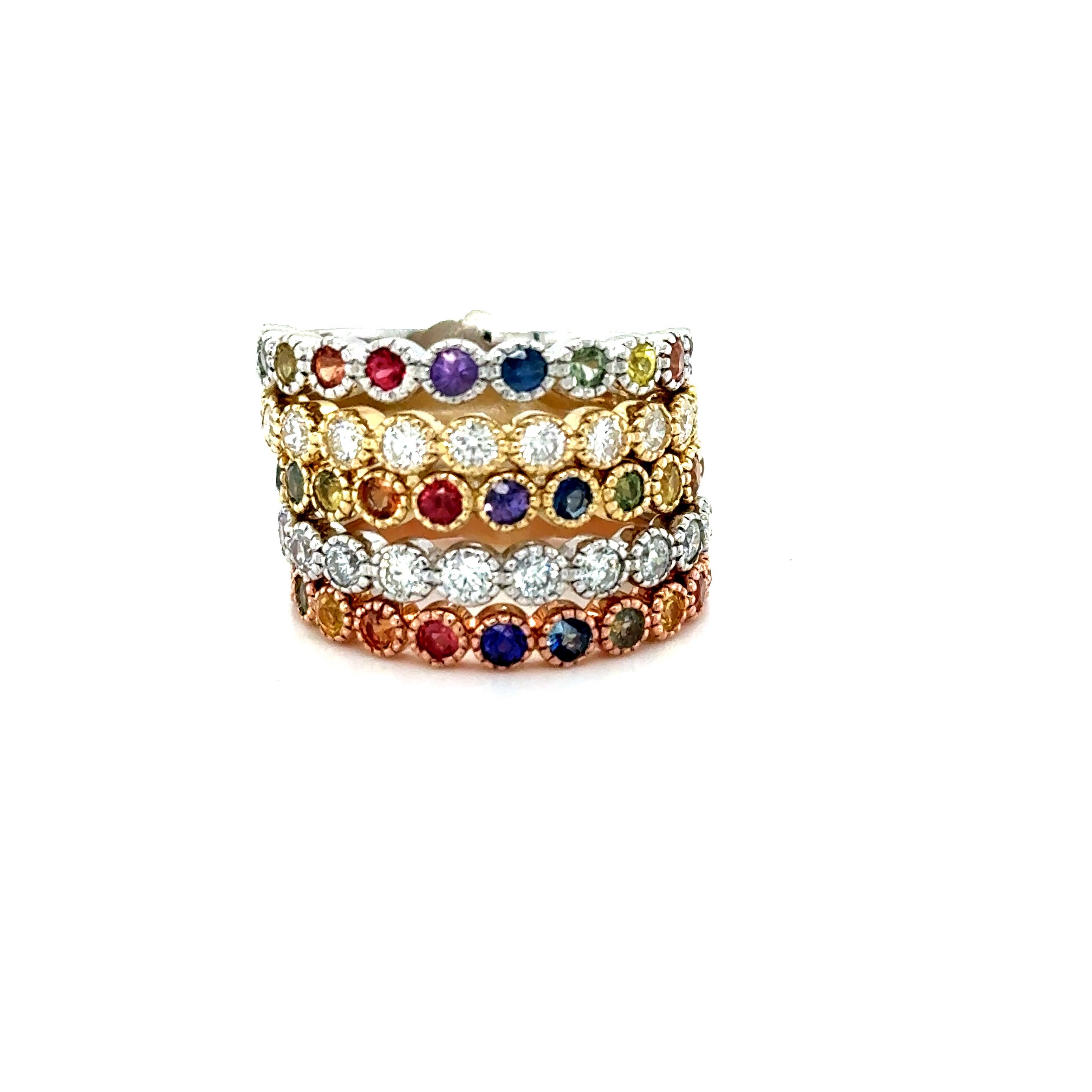2.84 Carat Diamond and Multi Color Sapphire Stackable Gold Band Set

Set of 5 elegant and classy 2.84 Carat Diamond and Sapphire bands that are sure to be a great addition to your accessory collection! There are 11 Round Cut Sapphires in 3 of the