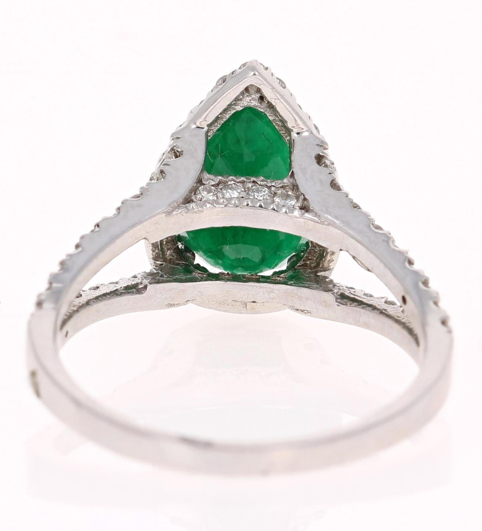 Modern 2.84 Carat Pear Cut Emerald Diamond Halo Engagement Ring