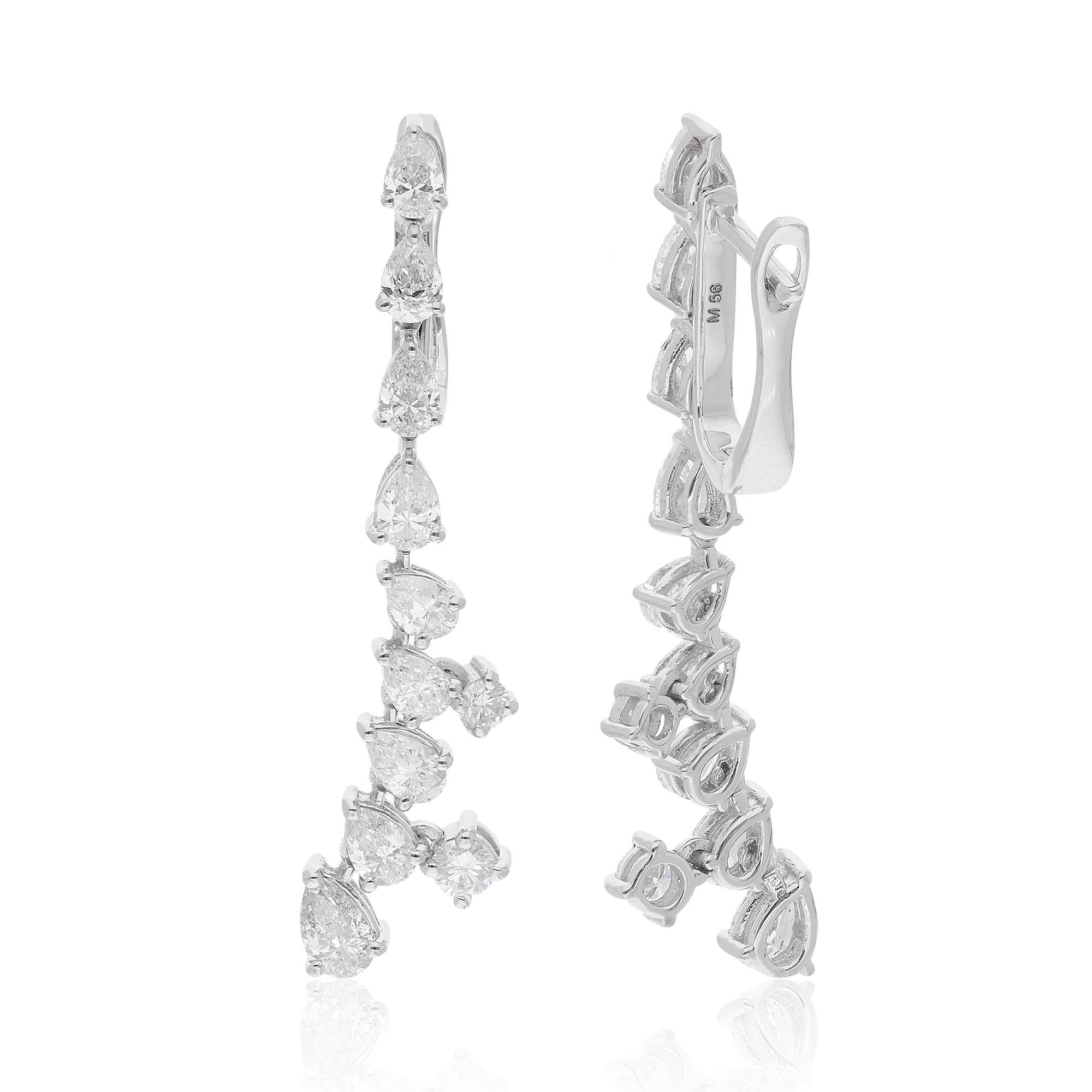 Elevate your style with the timeless elegance of these exquisite 2.84 Ct. Pear & Round Diamond Dangle Earrings, meticulously crafted in luxurious 14 Karat White Gold. This stunning pair of fine jewelry is a radiant celebration of sophistication and