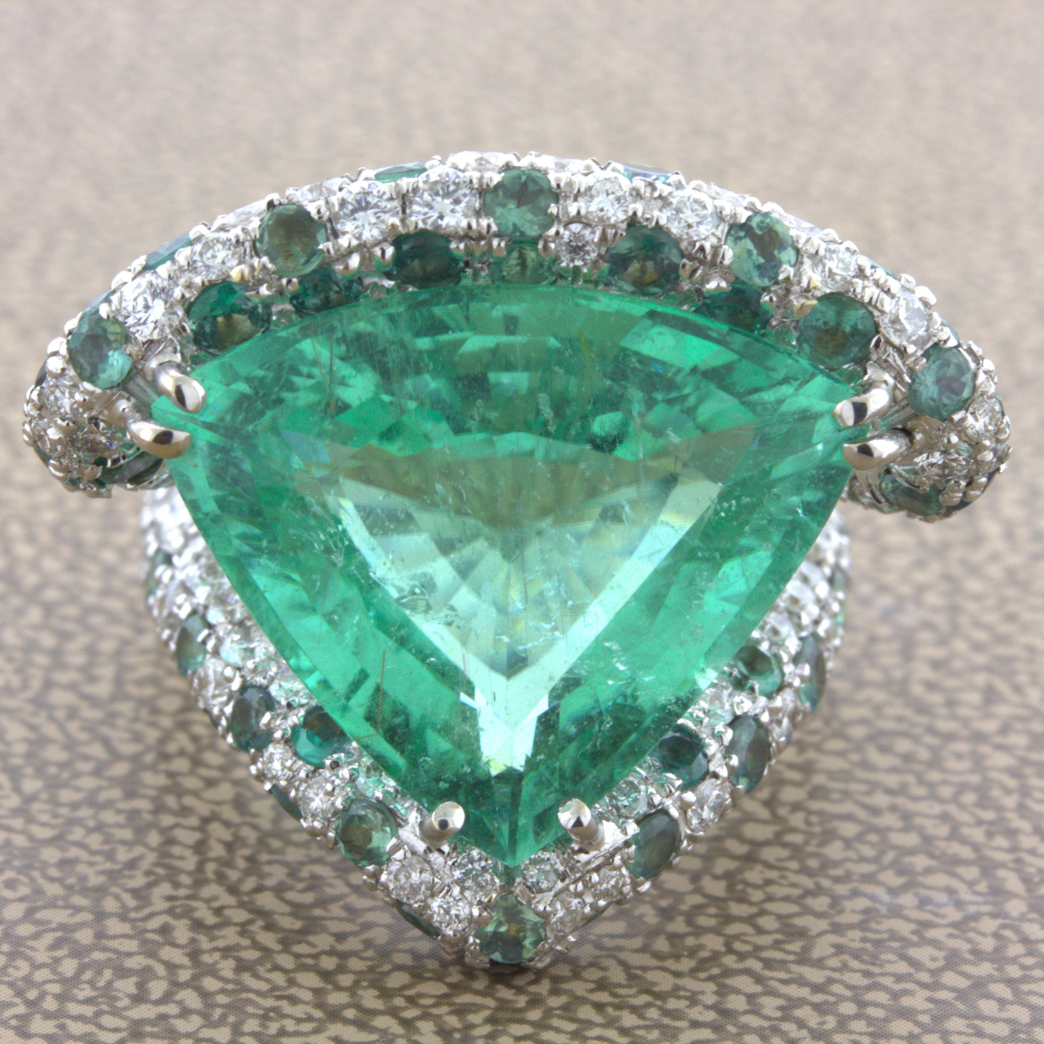 An extremely rare and unique gemstone, not only for its variety but also for its size and shape. The fine gem Paraiba weighs an impressive 28.41 carats and has a distinctive triangular shape which really sets it apart. It has a glowing vibrant