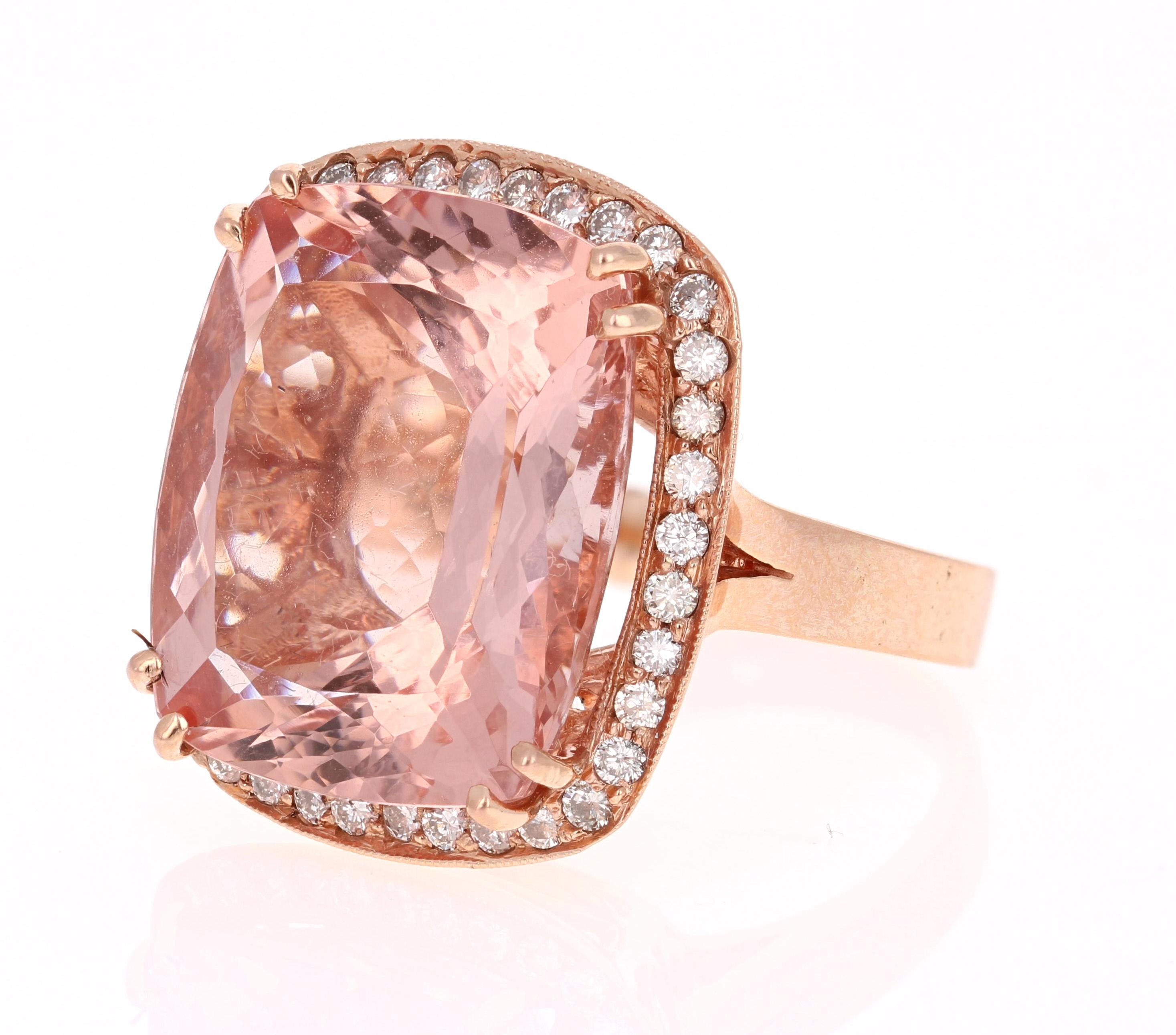 Stunningly large Morganite Diamond Ring!

This Morganite ring has a 27.52 Carat Cushion Cut Morganite and is surrounded by 36 Round Cut Diamonds that weigh 0.94 Carats. (Clarity: VS, Color: H) The total carat weight of the ring is 28.46 Carats. 