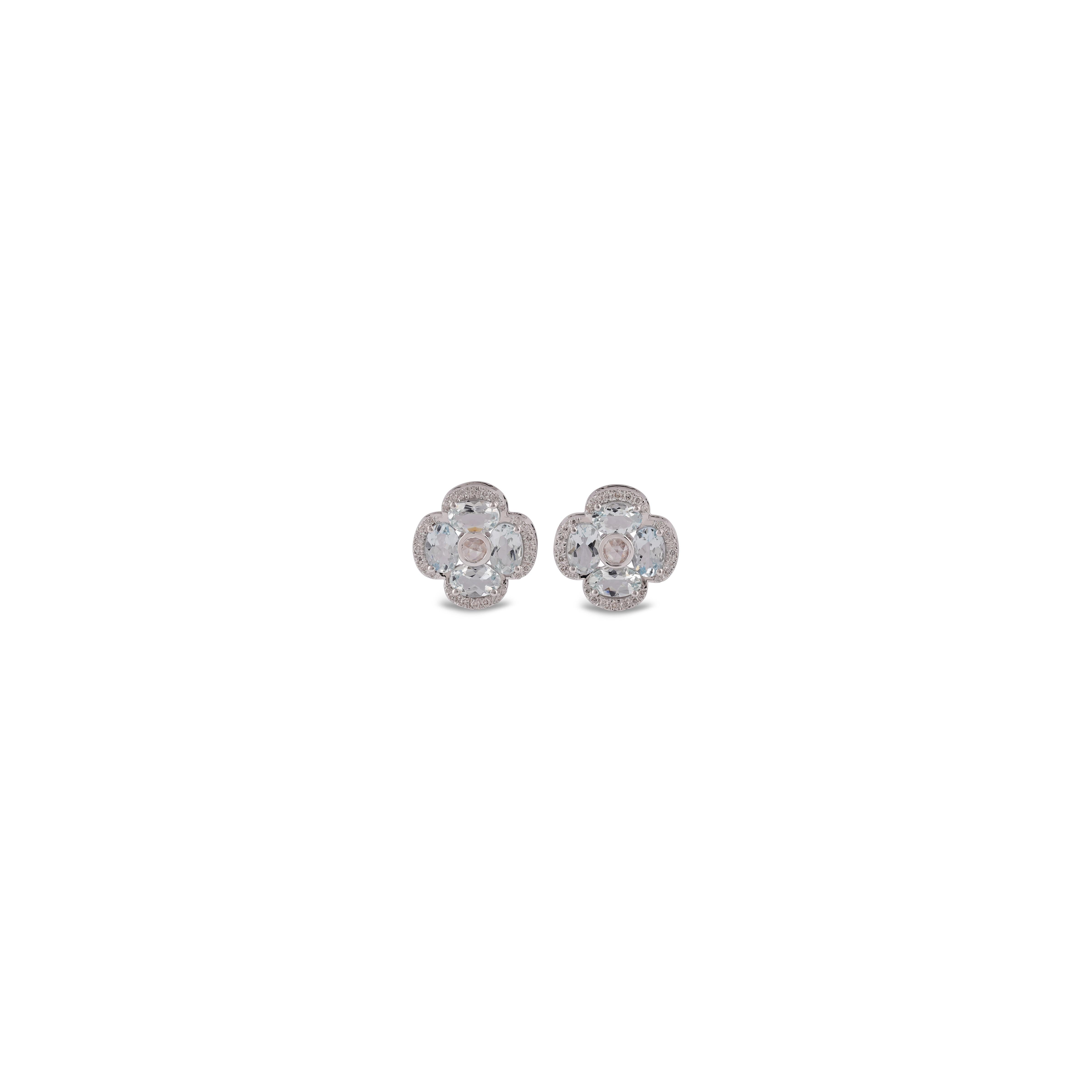 A stunning, fine and impressive pair of  2.85 carat Aquamarine and 0.29 carat Round diamond, 0.12 carat Rose cut Diamond with Solid 18k White Gold. 

Studs create a subtle beauty while showcasing the colors of the natural gemstones and illuminating