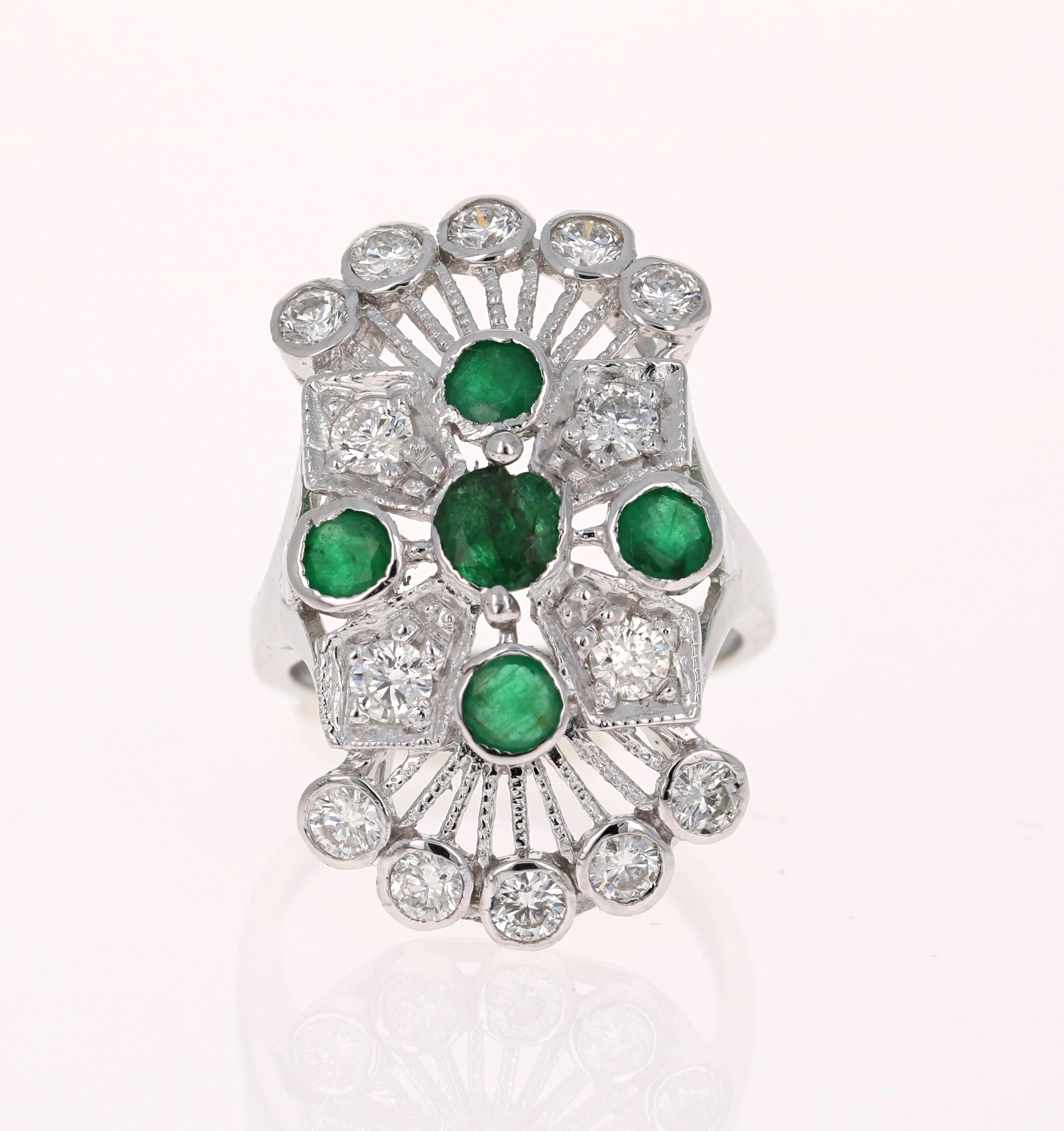 This ring has 6 Round Cut Natural Emeralds weighing 1.52 Carats and 14 Round Cut Natural Diamonds weighing 1.33 Carats. The total carat weight is 2.85 Carats

(Clarity: SI2, Color: F)

14K White Gold weighing approximately 8.8 Grams

It is a size 7
