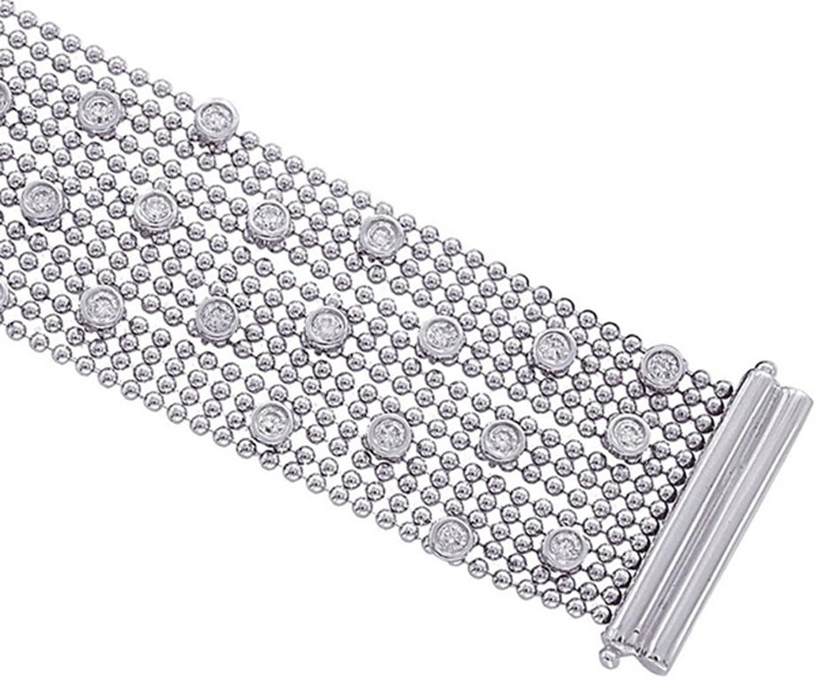 Contemporary 2.85 Carat Natural Diamond Bezel Bracelet G SI 14 Karat White Gold For Sale