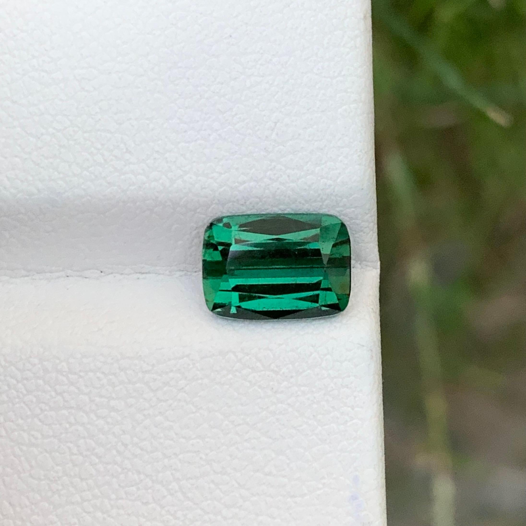 Loose Tourmaline 
Weight: 2.85 Carats 
Dimension: 9.3x6.6x5 Mm
Origin: Kunar Afghanistan 
Shape: Cushion 
Color: Green Lagoon
treatment: Non
Lagoon tourmaline, a stunning variety of the mineral tourmaline, derives its name from its striking