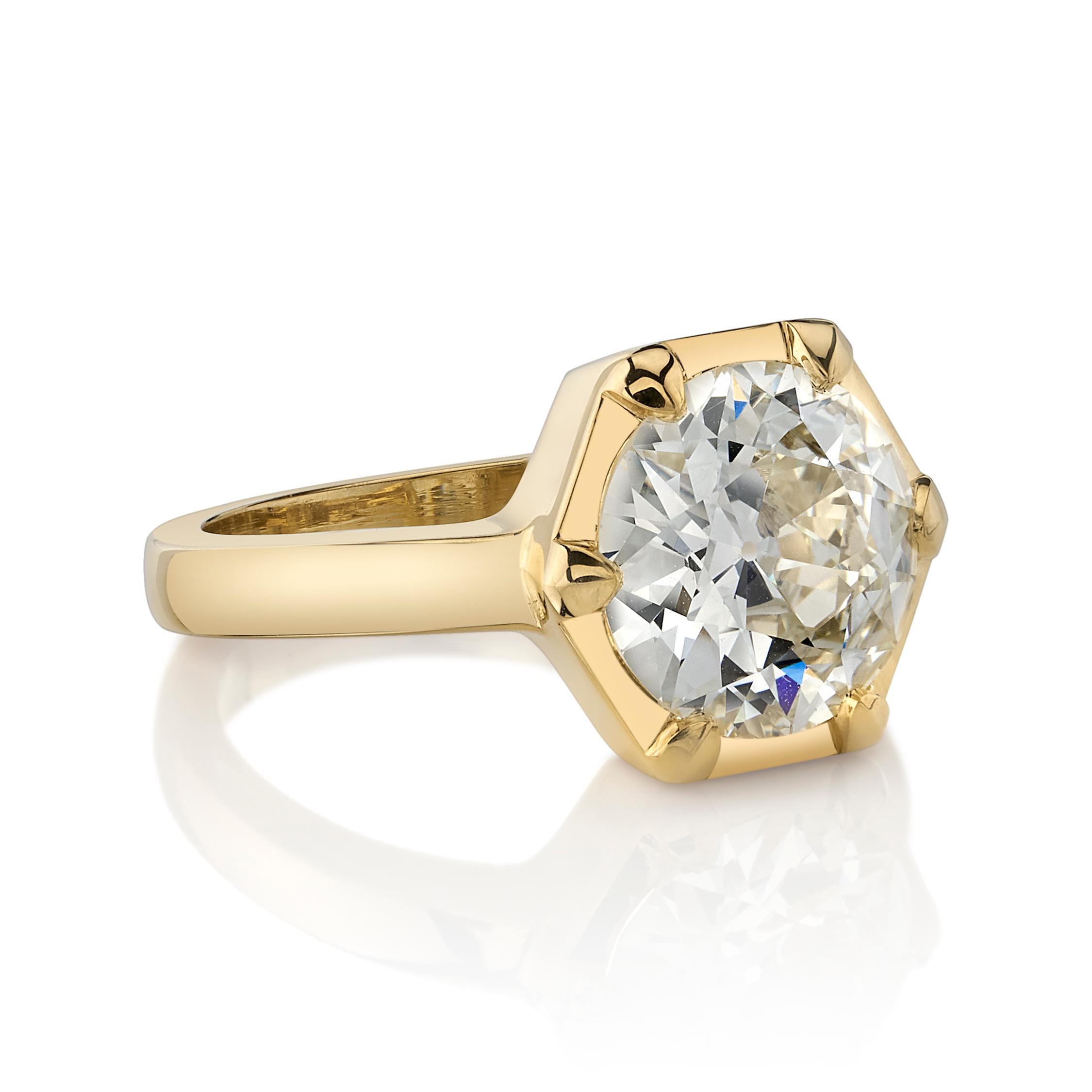 2.85ctw O-P/VS1 GIA certified old European cut diamond set in a handcrafted 18K yellow gold mounting.

Ring is a size 6 and can be sized to fit.