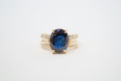 2.85 Carat Oval Cut Sapphire 14 Karat Gold Engagement Ring with Diamonds
