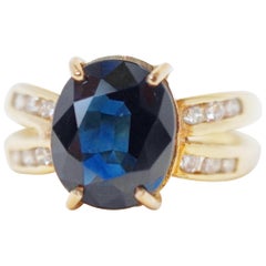 Used 2.85 Carat Oval Cut Sapphire 14 Karat Gold Engagement Ring with Diamonds