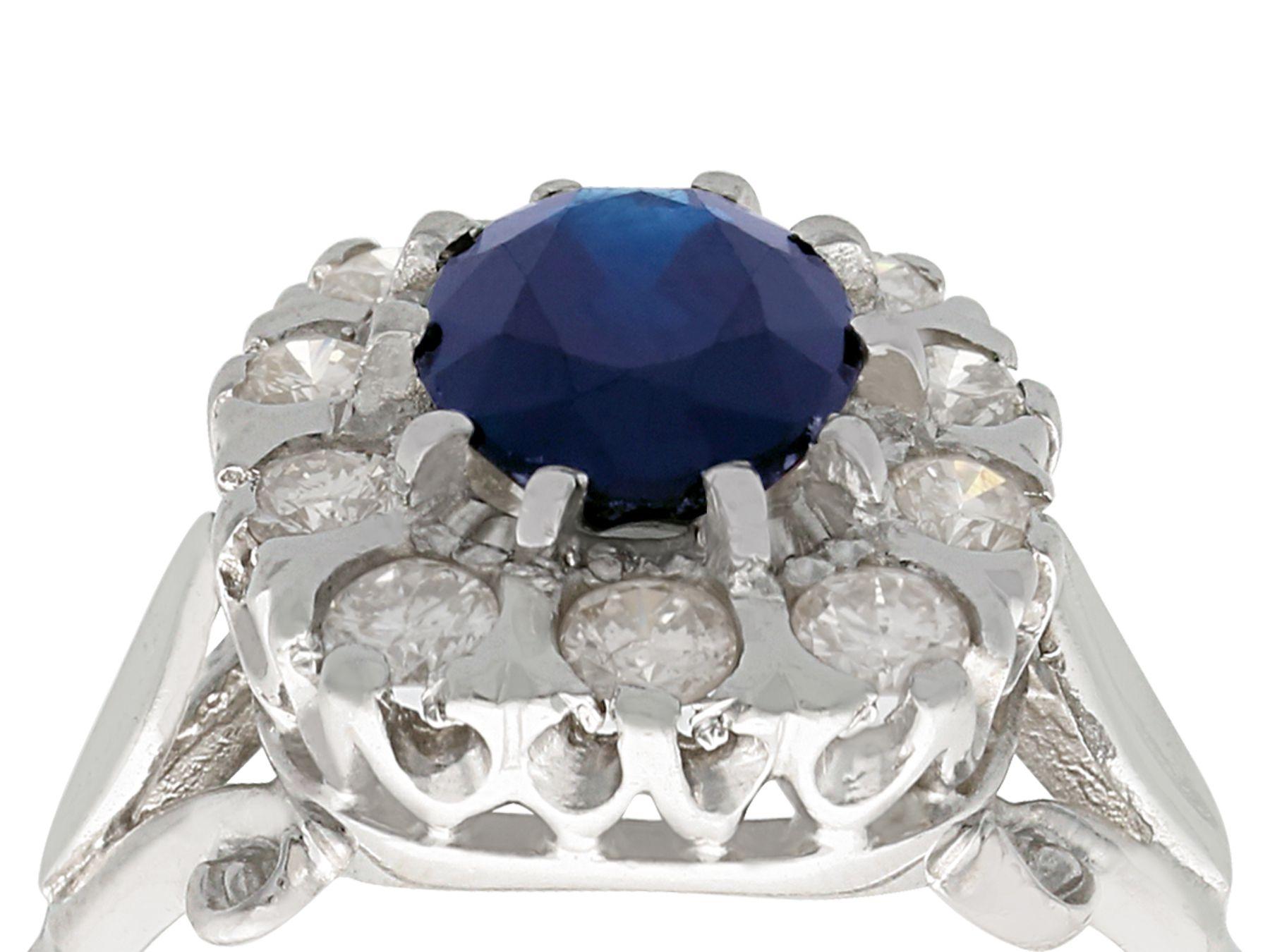 A stunning, fine and impressive vintage 2.85 carat natural blue sapphire and 0.65 carat diamond, 18 karat white gold dress / cluster ring; part of our diverse vintage jewelry/estate jewelry collections

This stunning, fine and impressive sapphire