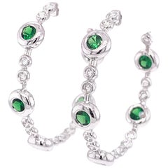 2.85 Carat Tsavorite and 0.79 Carat White Diamond Hoop Cocktail Earring