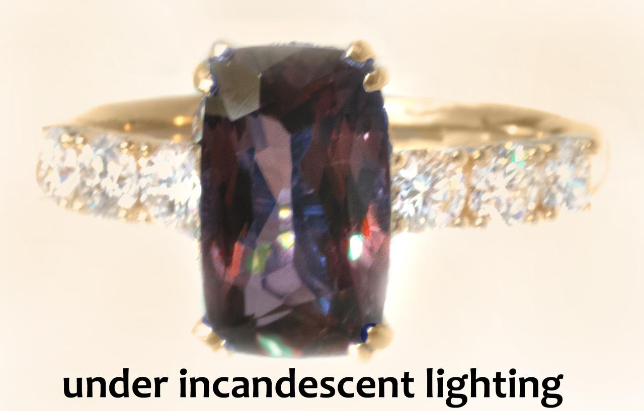 Behold this very rare, cushion-cut alexandrite.  To complement such a gemstone we made a setting in solid 18K yellow gold with a diamond swirl basket and larger colorless diamonds on the highly polished band. 
 
Gemstone:
 
Natural Alexandrite
