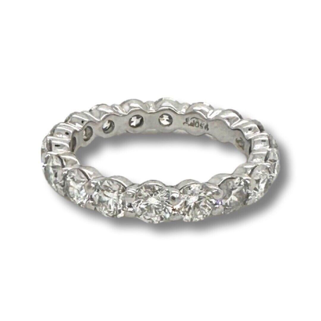 Style: Eternity Ring

Metal: Platinum

Stones: 19 Round Diamonds

Diamond Carat Weight: approx. 2.85ct

Diamond Clarity: VS1 - VS2

Diamond Color: E - F

Ring Size: 6.25

Total Weight (grams): 4.6

Includes: Brilliance Jewels 2 Year Warranty

      