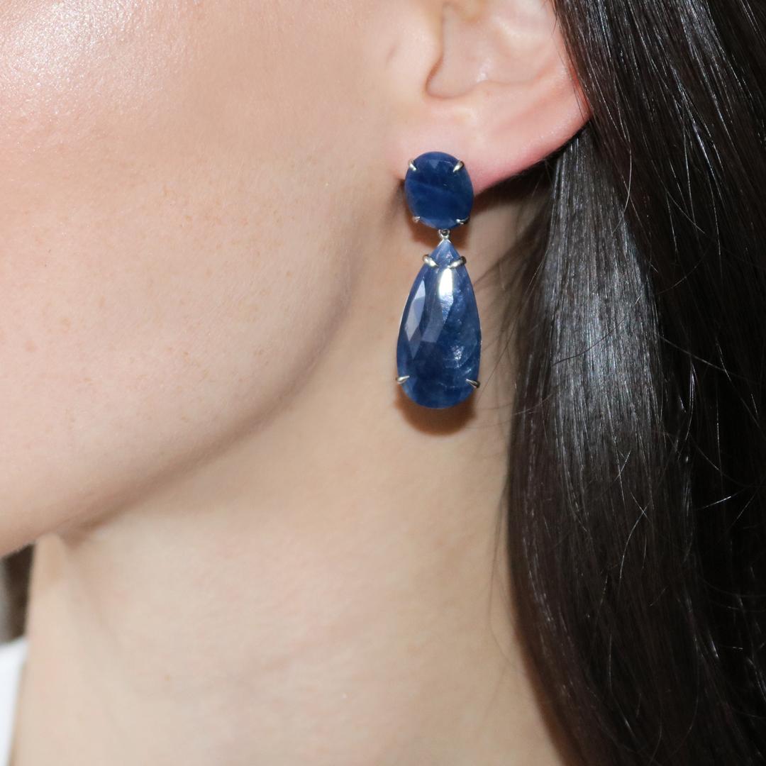 One of a kind round shape blue sapphire earrings with pear shaped blue sapphires set in 18kt white gold with a butterfly back.

Very comfortable due to their minimal weight, they are to be enjoyed for an all-day wear.

Blue Sapphire Top: 7.70