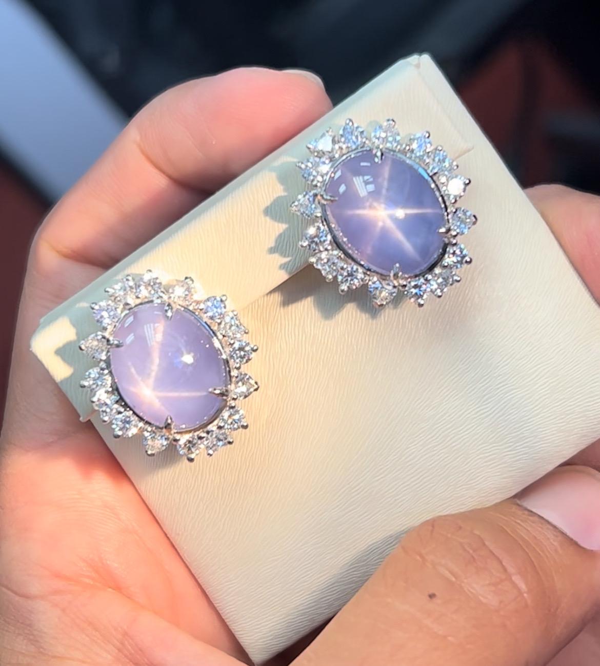 Modern 28.50ct Star Sapphire earrings in platinum. GIA certified. For Sale